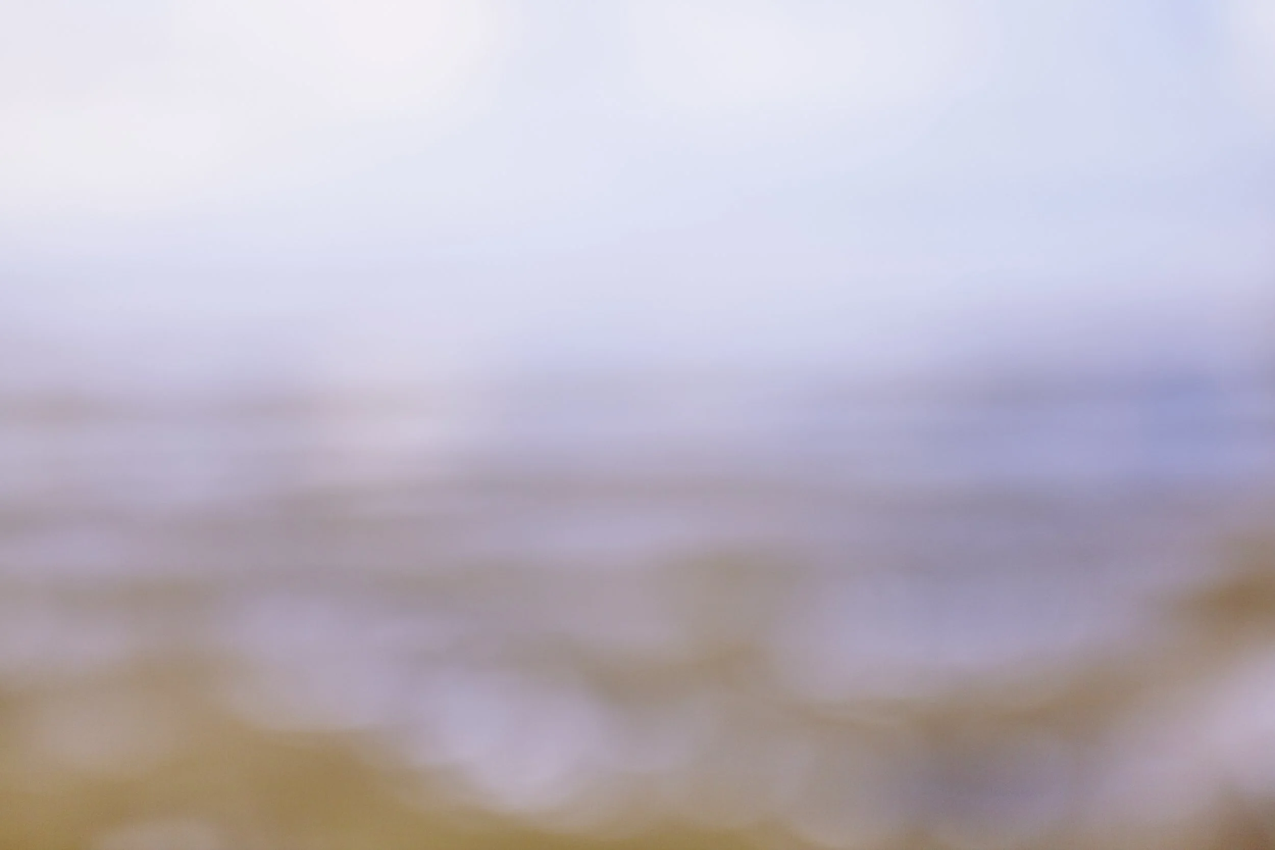 Blurred image with no discernible objects or features.