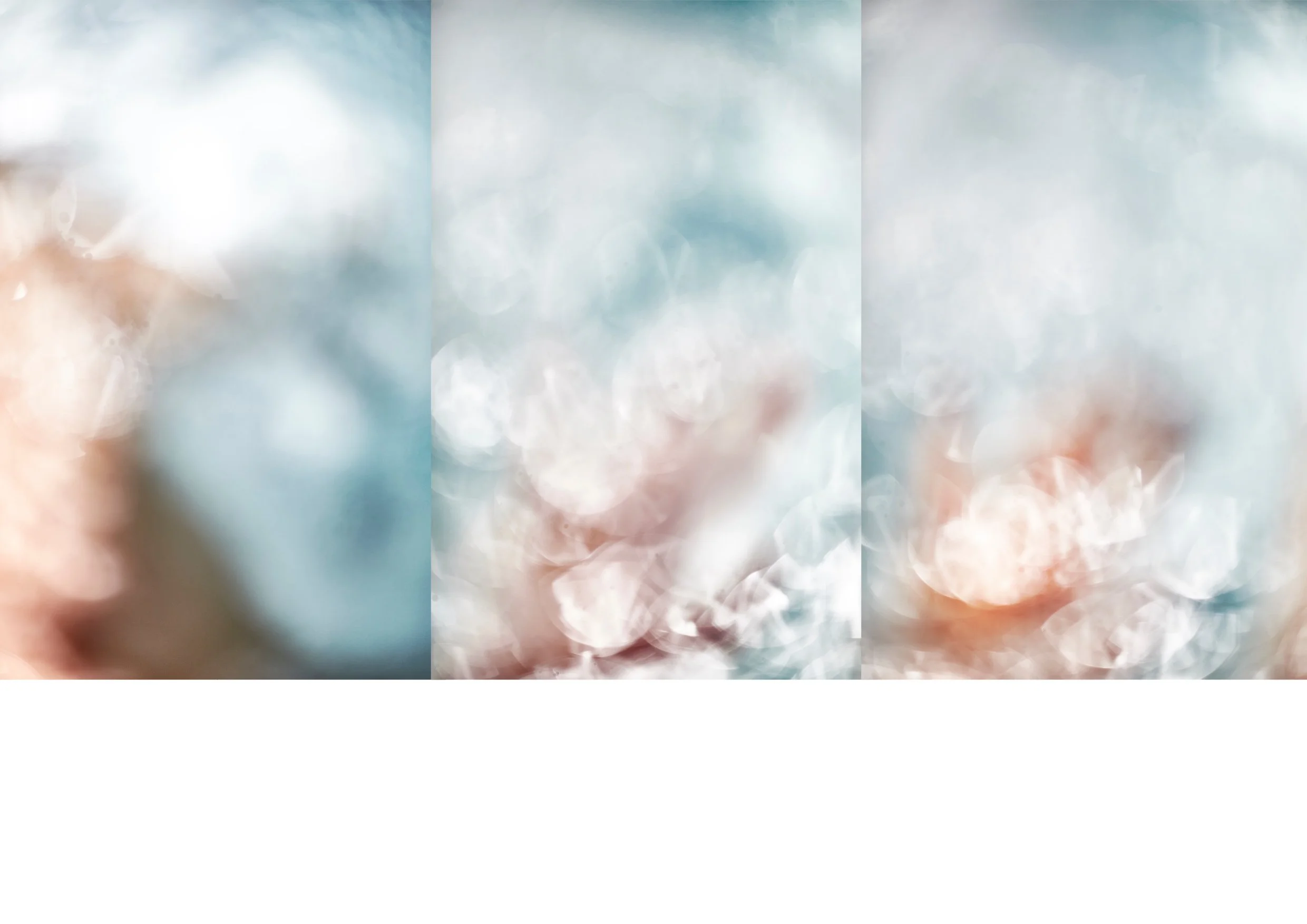 Abstract background with soft, blurred bokeh lights in shades of white, blue, and light brown.