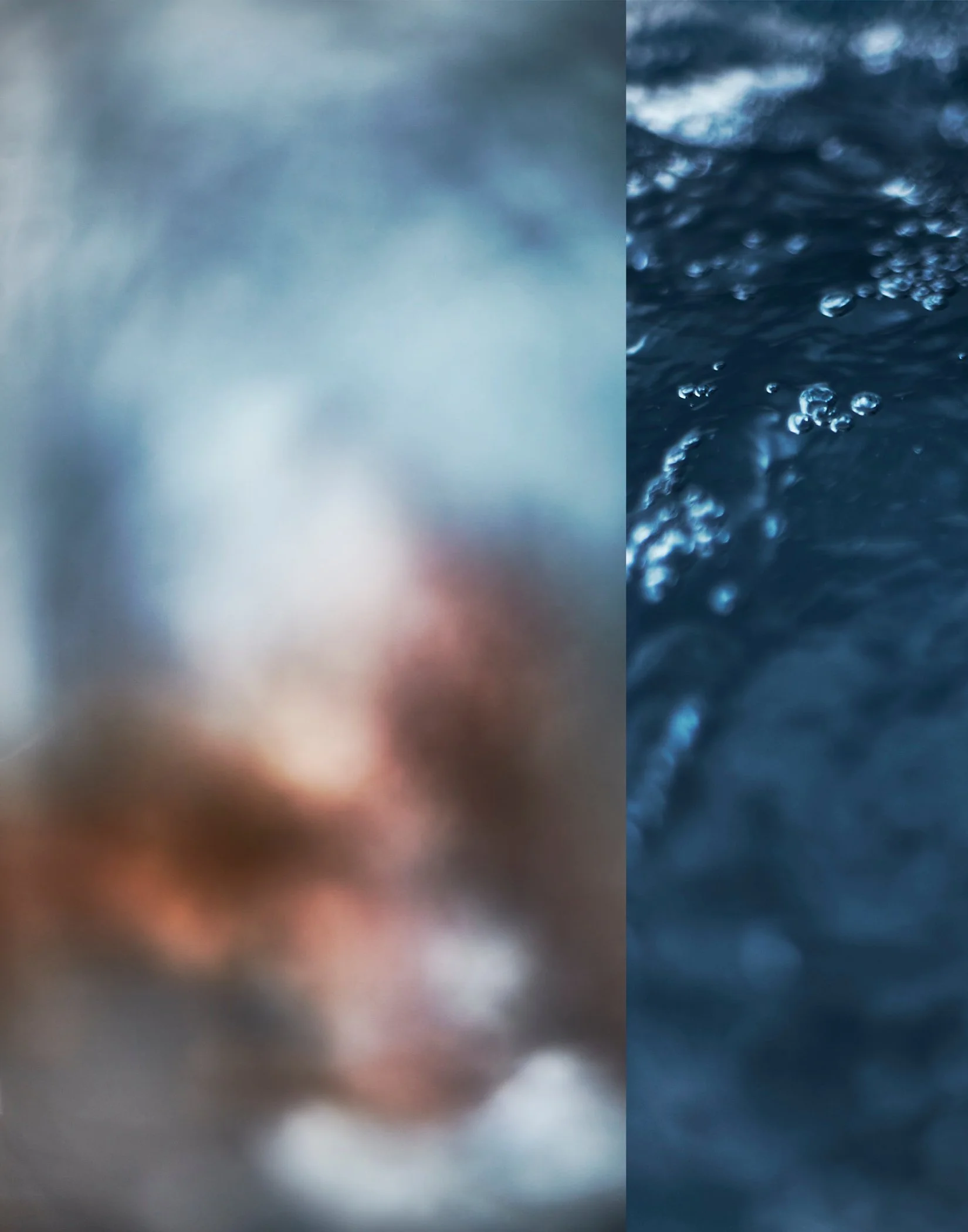 Blurred image with a cloudy sky on the left and water with bubbles on the right.