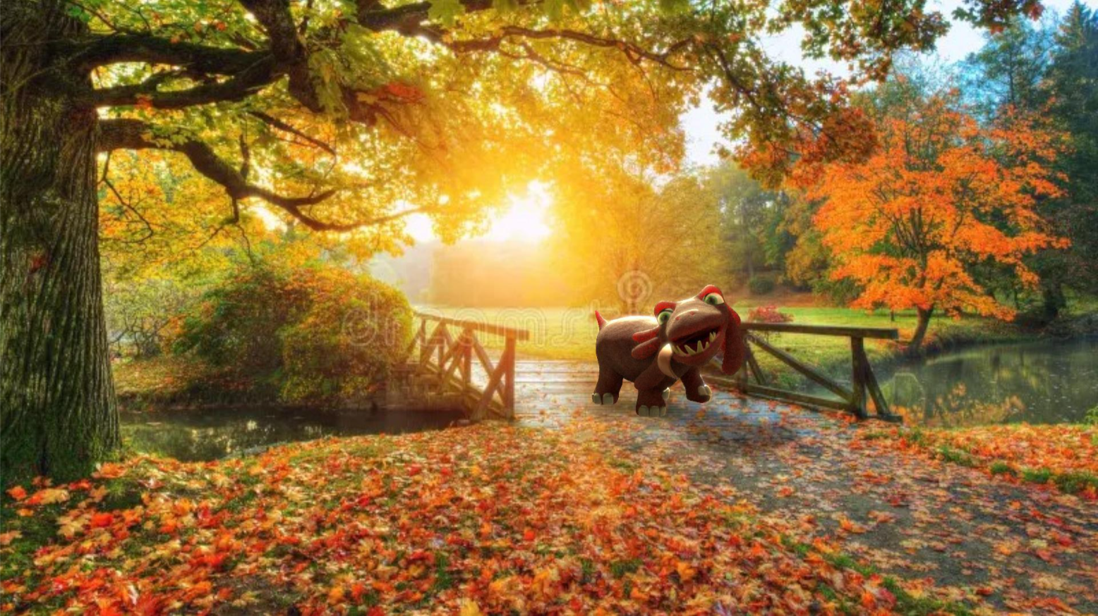 A model of a cartoon dinosaur standing on a fallen leaf-covered path in an autumnal park, with a small bridge over a pond, lush colorful trees, and sunlight streaming through the branches.