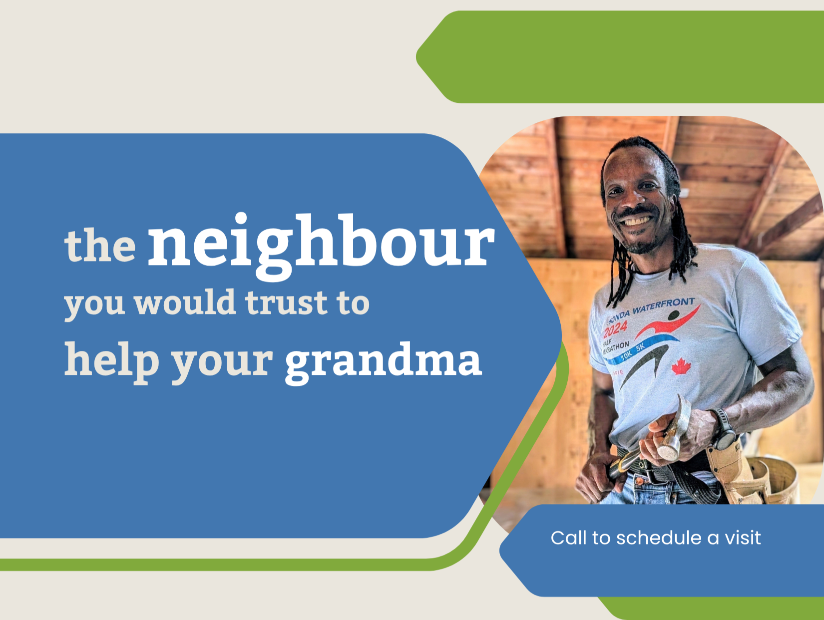 Marcus McLean - Odd Jobs McLean with long dreadlocks smiling and holding a hammer, standing inside a wooden building, wearing a blue graphic t-shirt with promoting neighbour trust and community help.