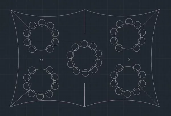 Blueprint drawing of a square with four circular patterns at each corner, each composed of smaller circles, with additional small circles and lines connecting them.