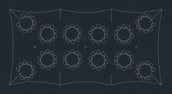 Blueprint of a complex structure with multiple circular patterns connected by lines.