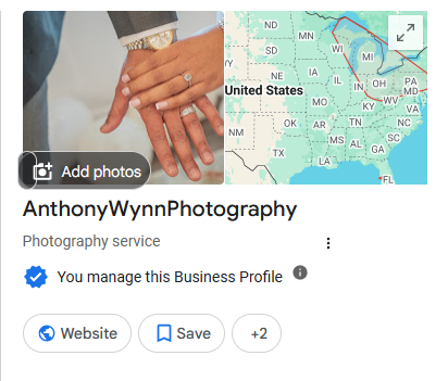 Close-up of a person's left hand showing a wedding ring on the ring finger, with a map of the United States in the background.