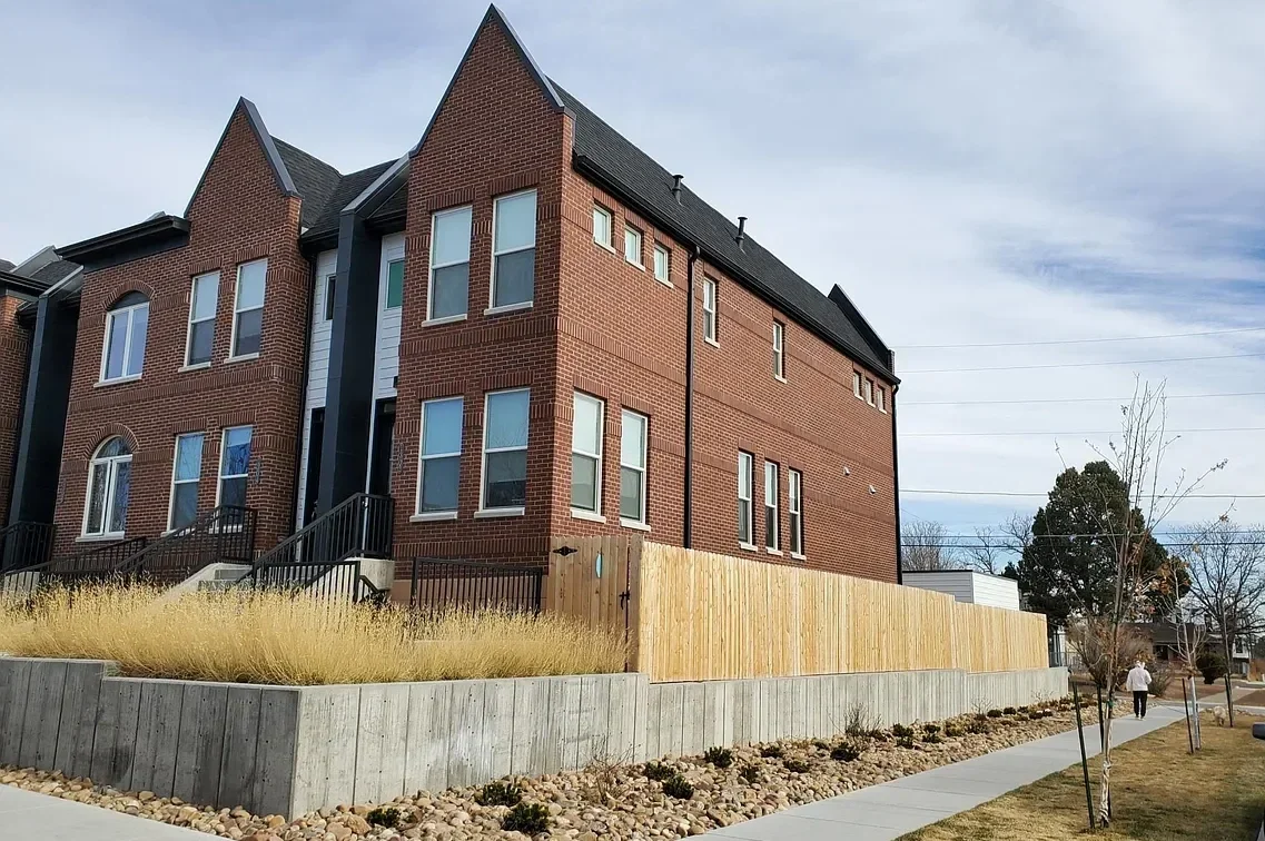 Brick brownstone-style townhome at 1302 Quitman Street, Denver