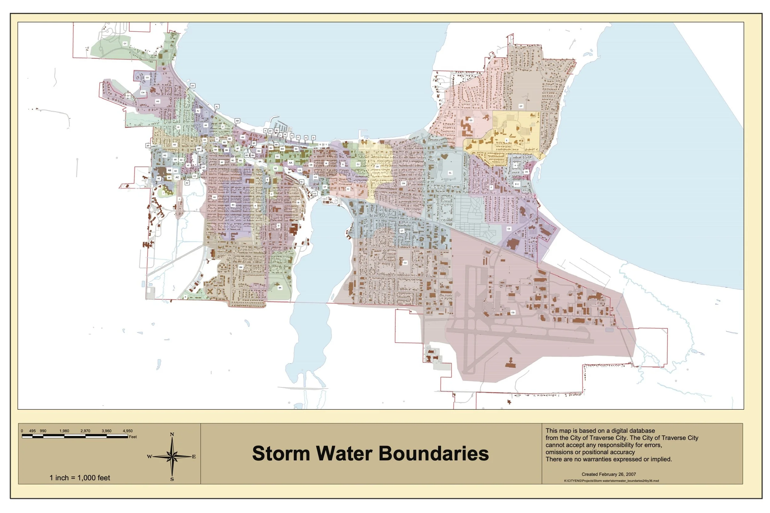 Map of Traverse City displaying storm water boundaries with different colored zones, water bodies, and city roads, dated February 26, 2007.