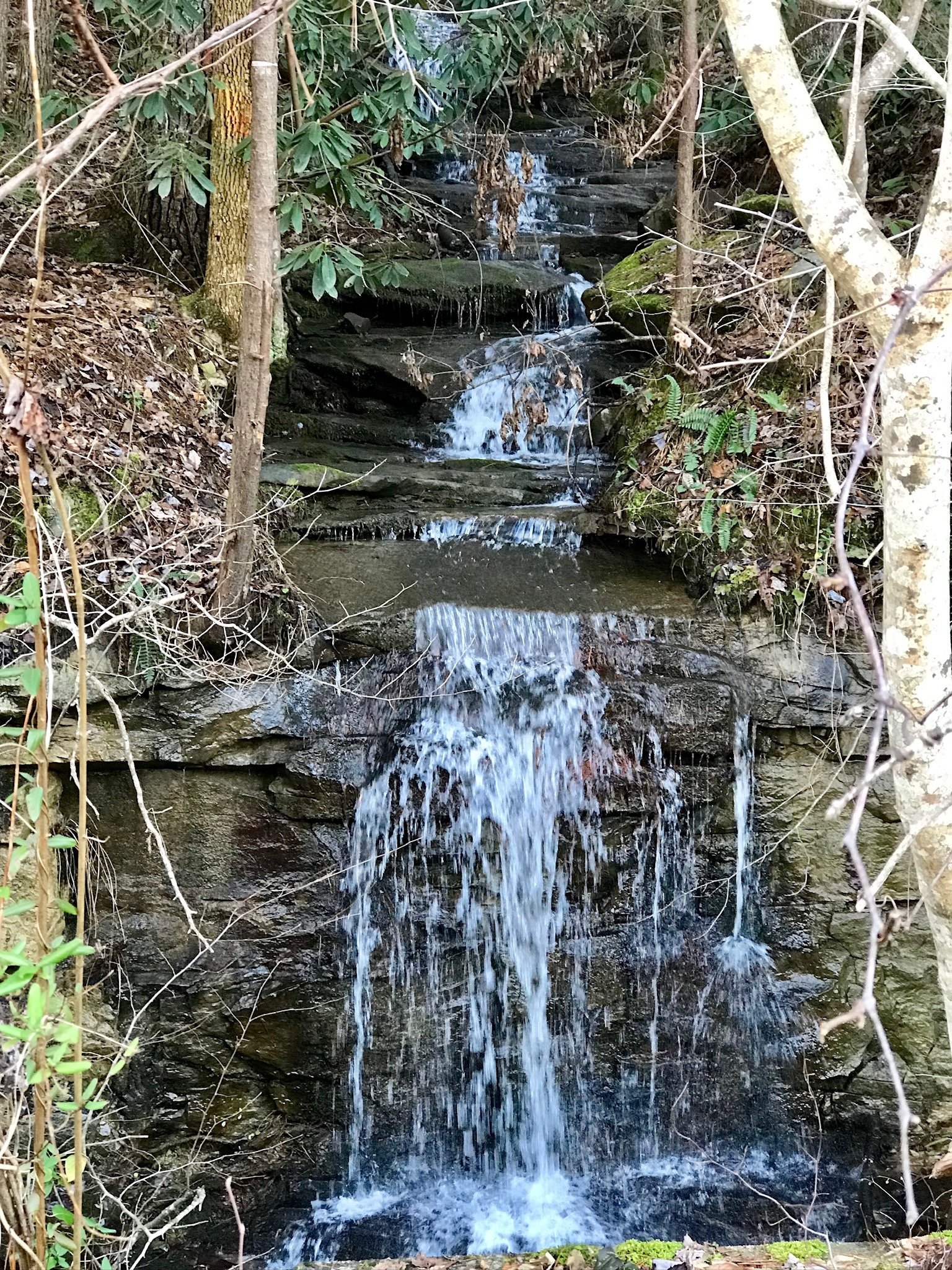 Natural waterfall found while hiking the old 52 HWY - now pedestrian trail along the river towards RM Brooks General Store.