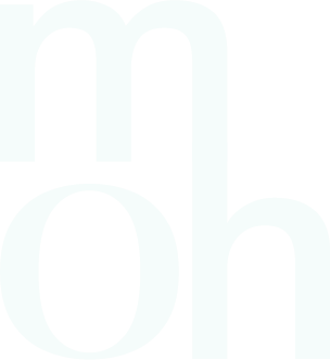 Close-up of the letters 'm' 'o' and 'h' in white text on a black background.