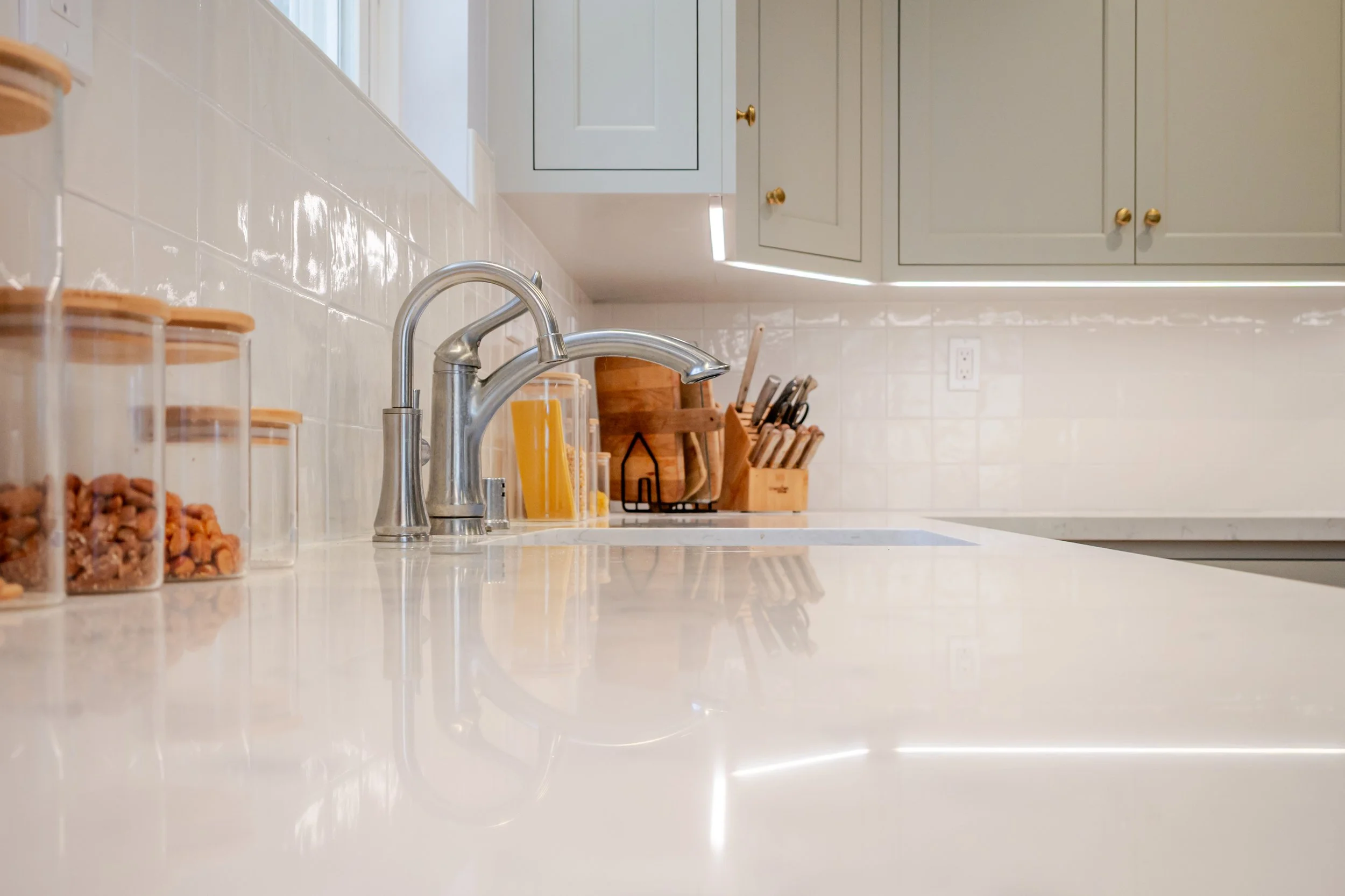 Light Gray Kitchen with Brass Hardware