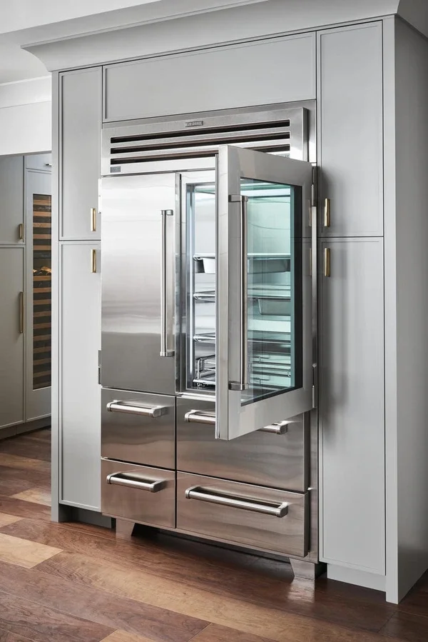 built-in stainless-steel refrigerator in a modern kitchen