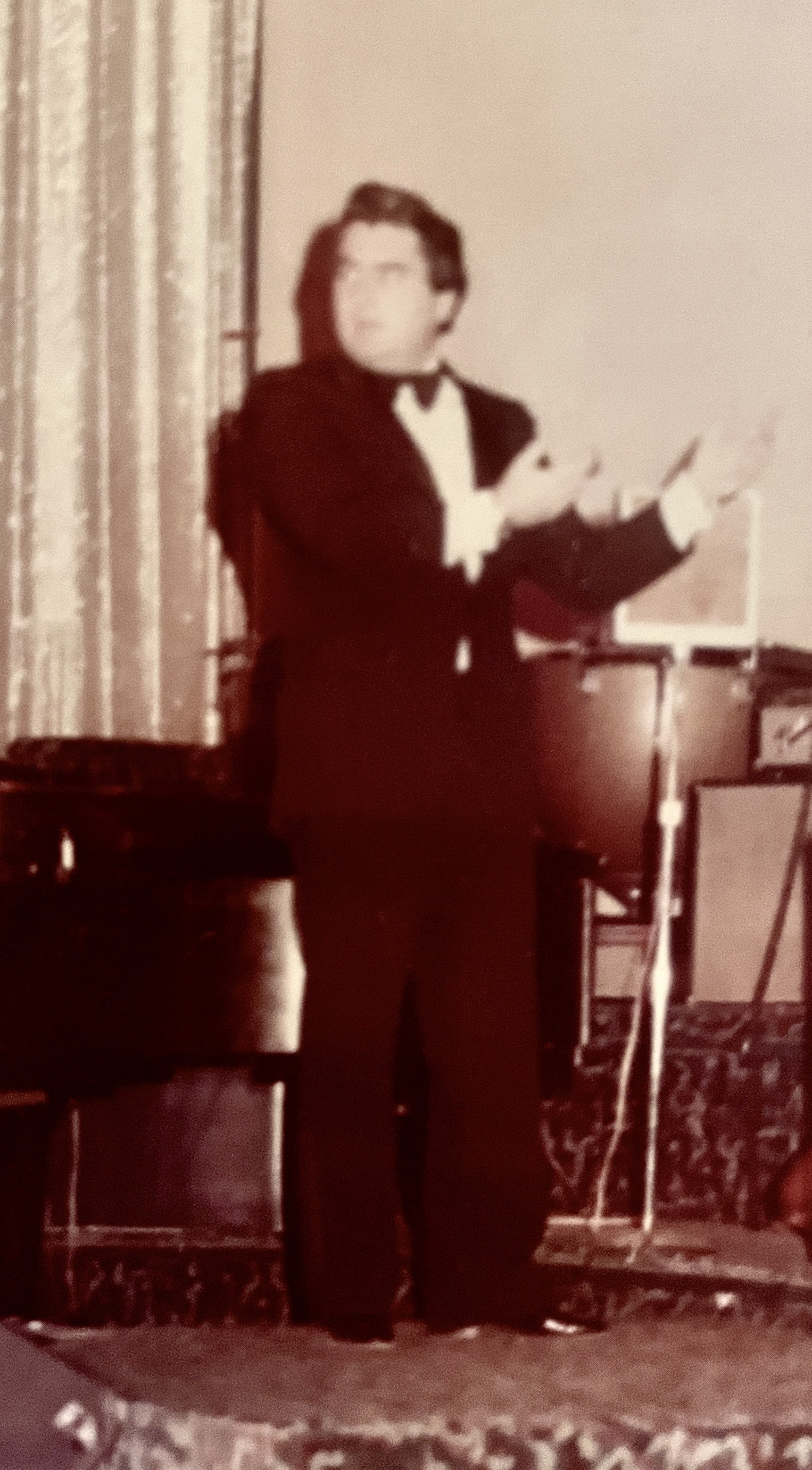 Dad conducting mom's orchestra: totally faking his way through.