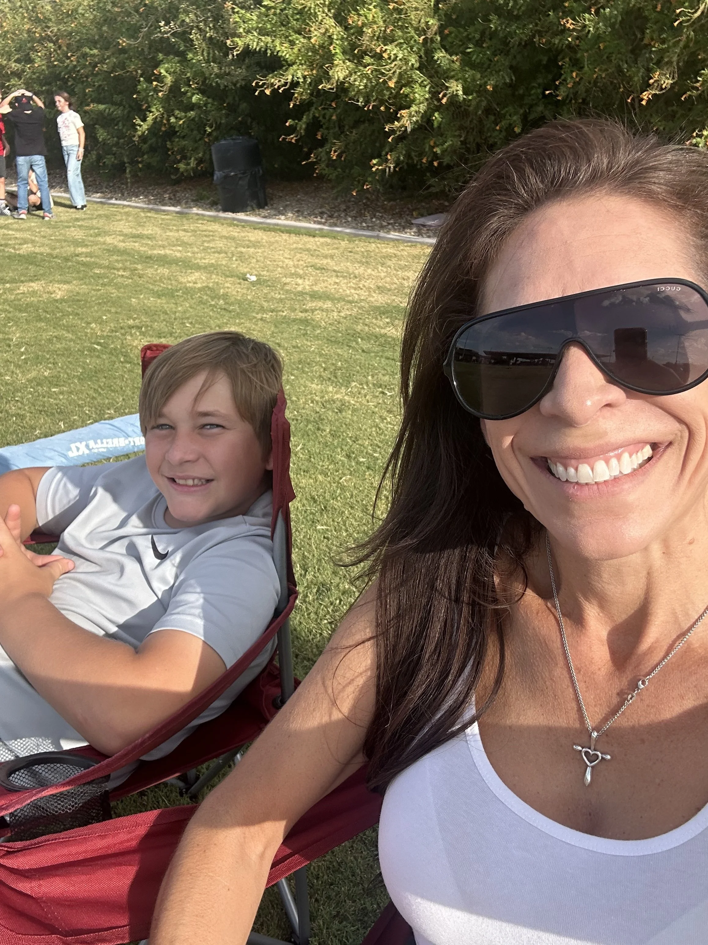 Cheering brother at flag football CCV Surprise
