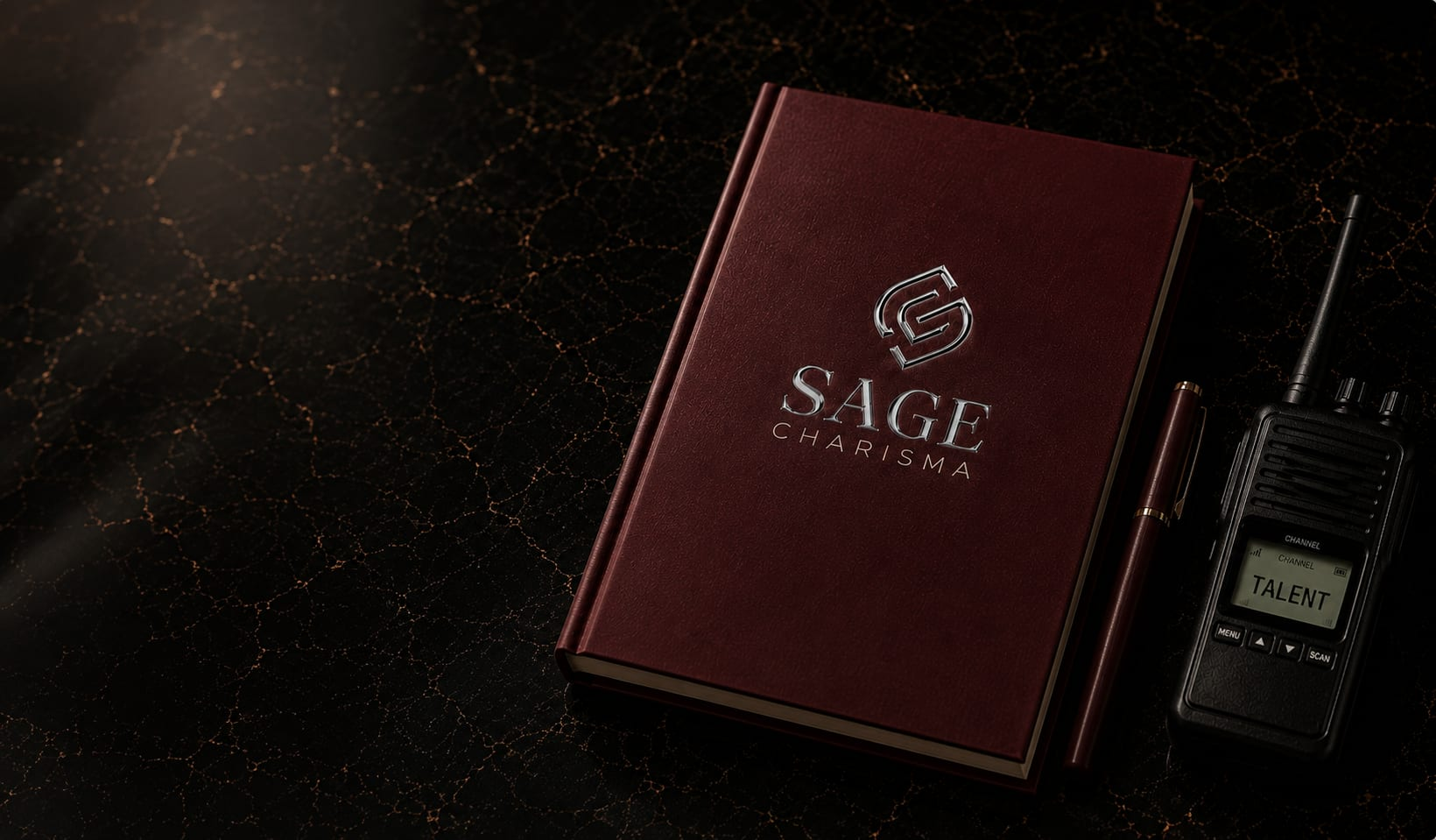Sage Charisma talent operations setup with branded notebook, radio, and coordination tools for live events and VIP experiences.