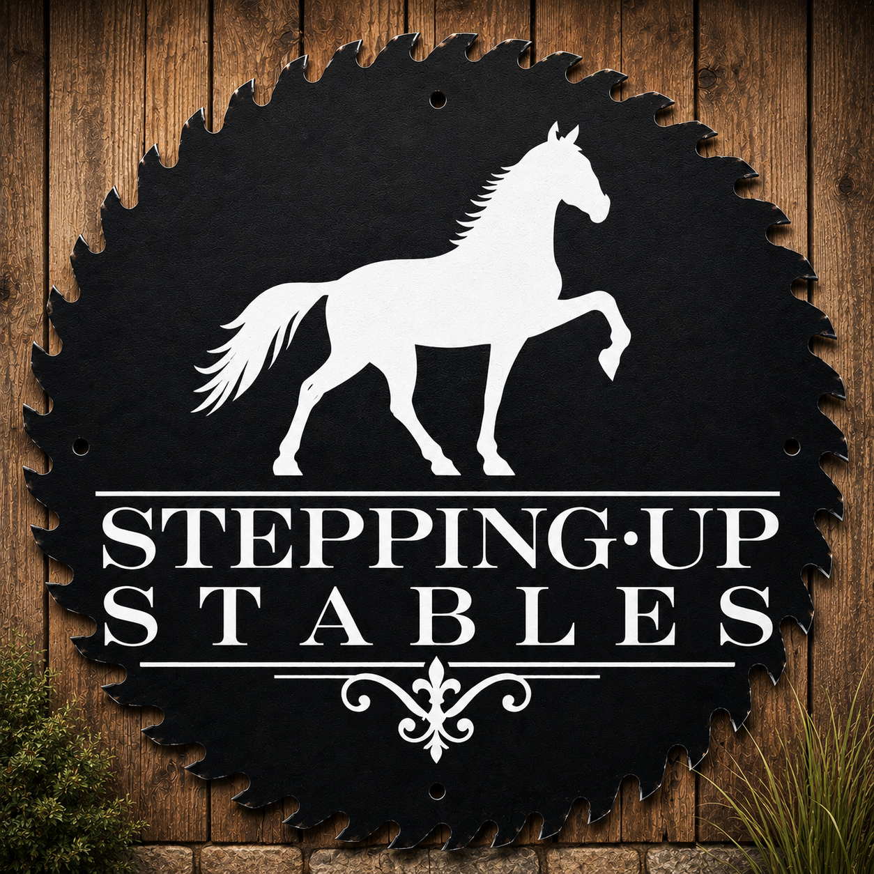 Sign for Stepping Up Stables, featuring a white horse silhouette on a black background with decorative elements, mounted on awooden wall.