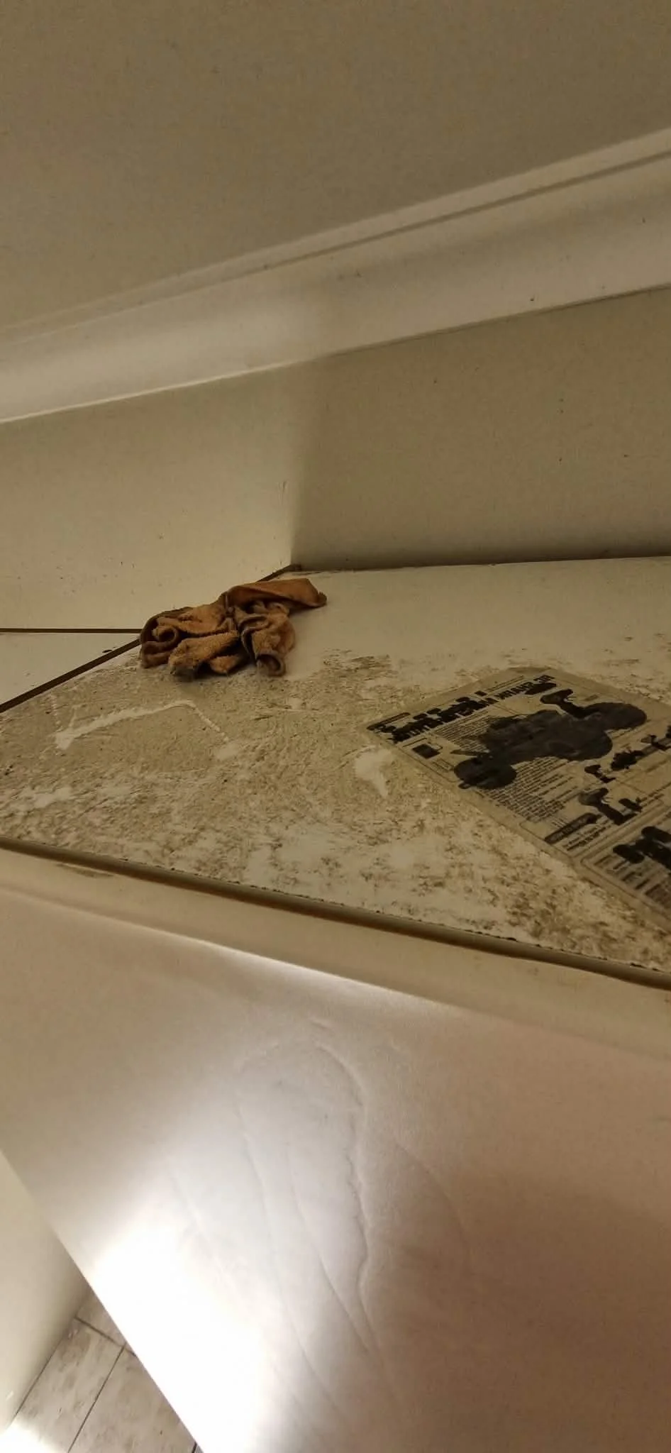 Kitchen top cabinetry dirty with grease