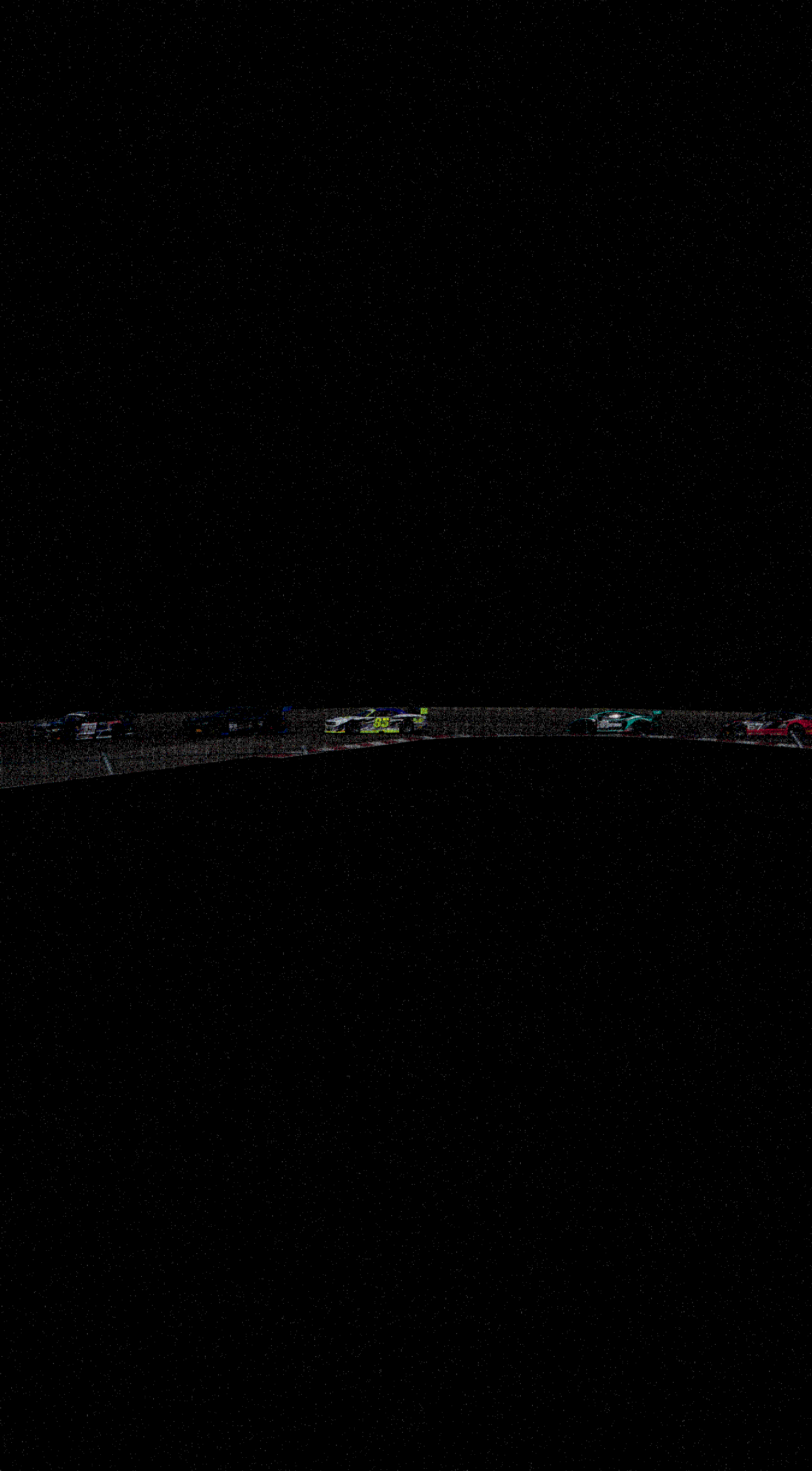 A row of parked cars under a star-filled night sky.