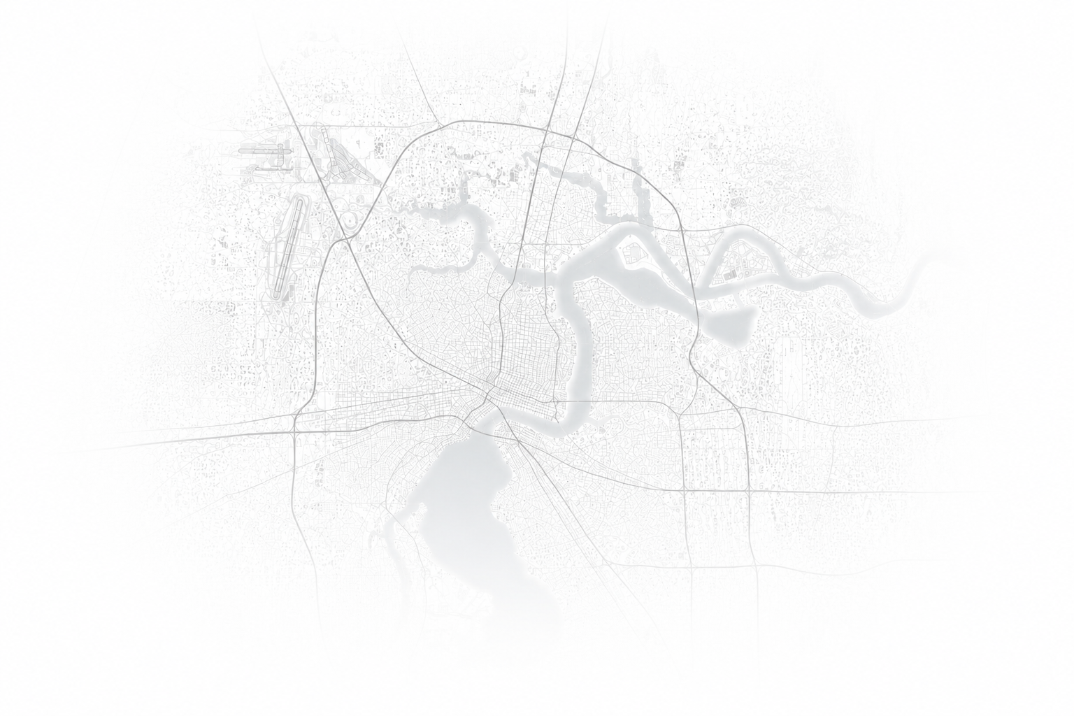 A grayscale map of a city with streets, waterways, and land features, faintly visible in the background.