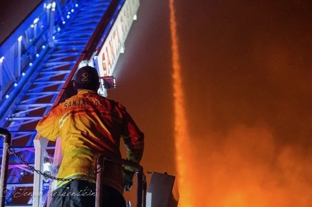 Matt, assigned to Santa Rosa Fire Dept. Truck 1, operating an elevated master stream preventing further fire spread to the Luther Burbank Events Center. Tubbs Fire, Santa Rosa, October 2017. 