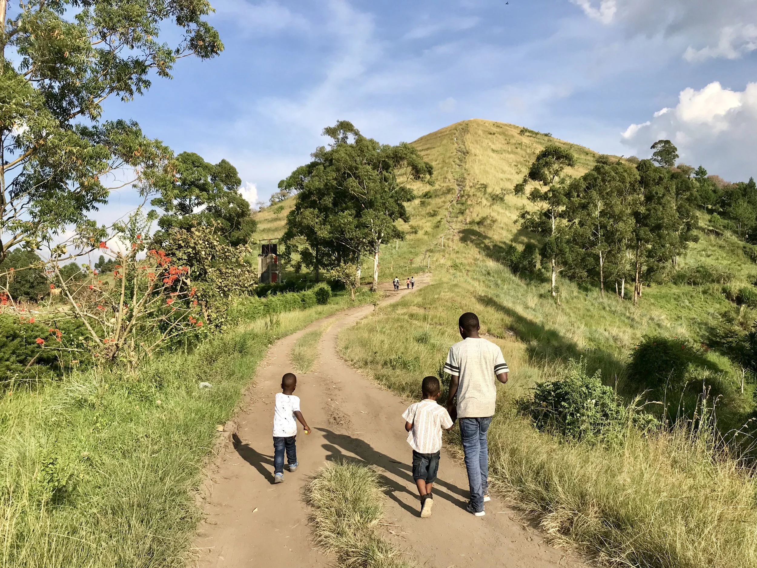 Children Walking Towards Kyenganywa Hill
Fort Portal,  Western, Uganda