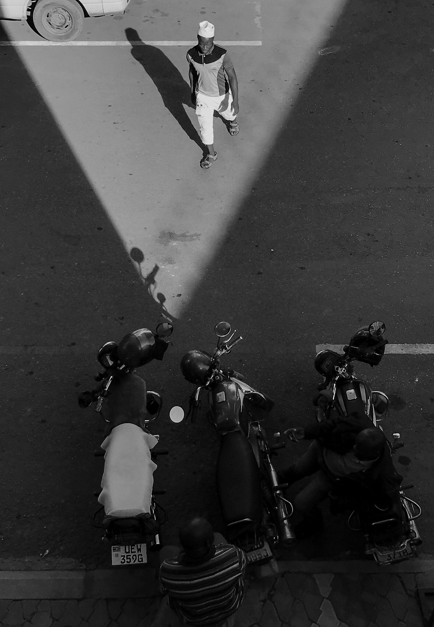 A pedestrian crossing Bussel Road. Kampala, Uganda.