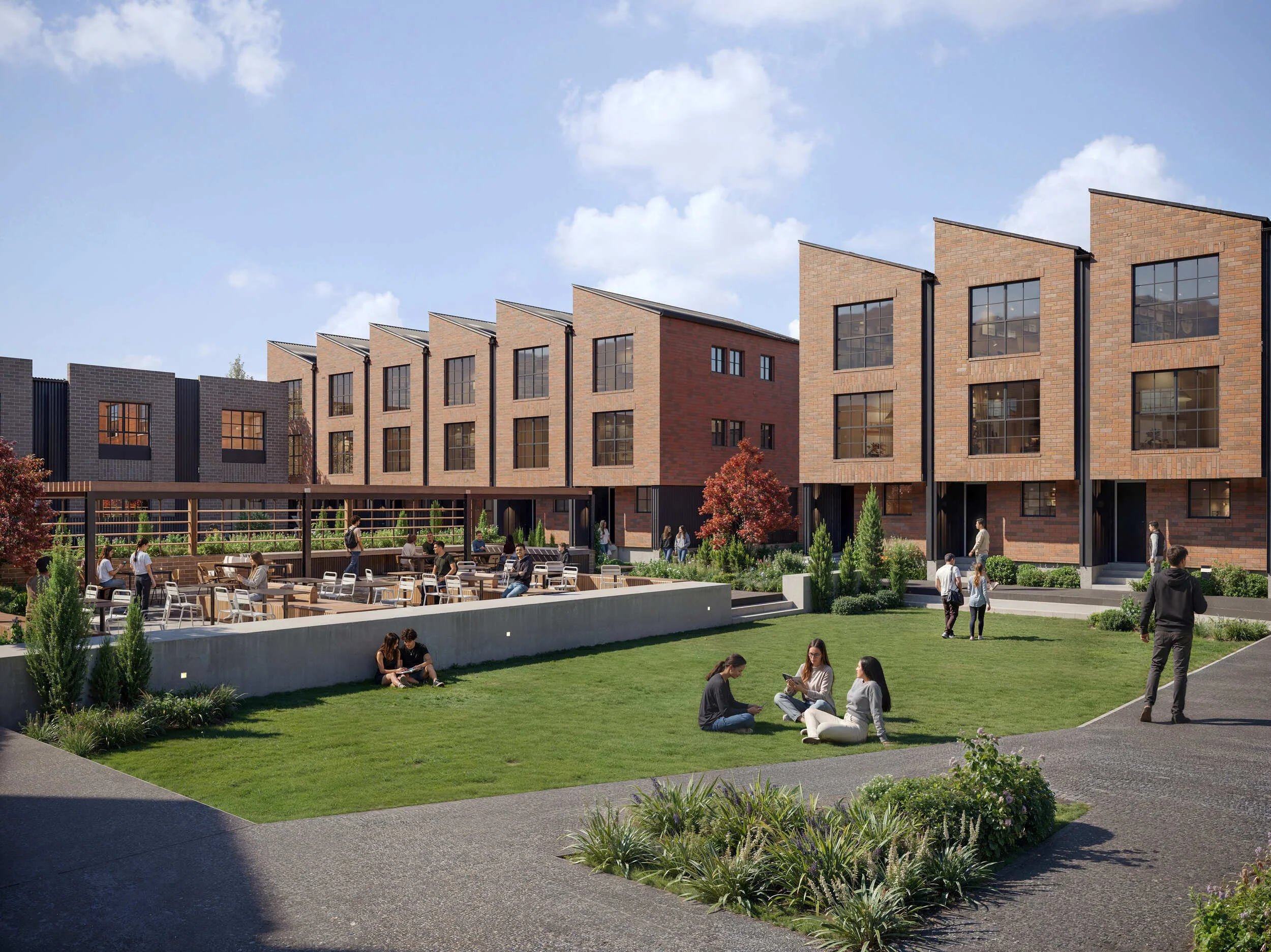 Modern residential buildings with large windows and a terraced design, surrounded by a landscaped courtyard with people sitting and walking on green lawns and pathways under a partly cloudy sky.