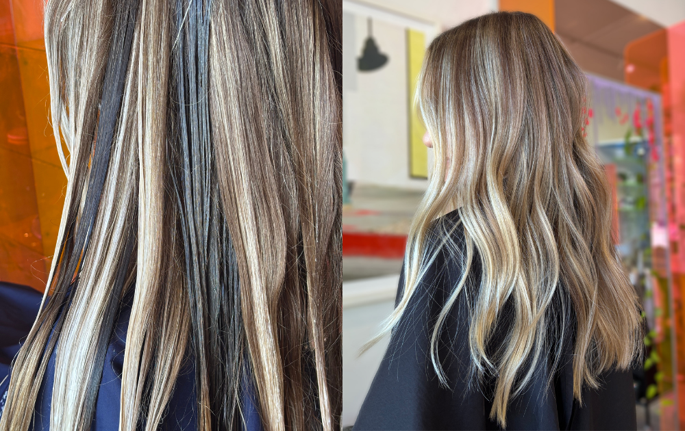 Side view of a woman with long, wavy, blonde hair in a salon or indoor setting.