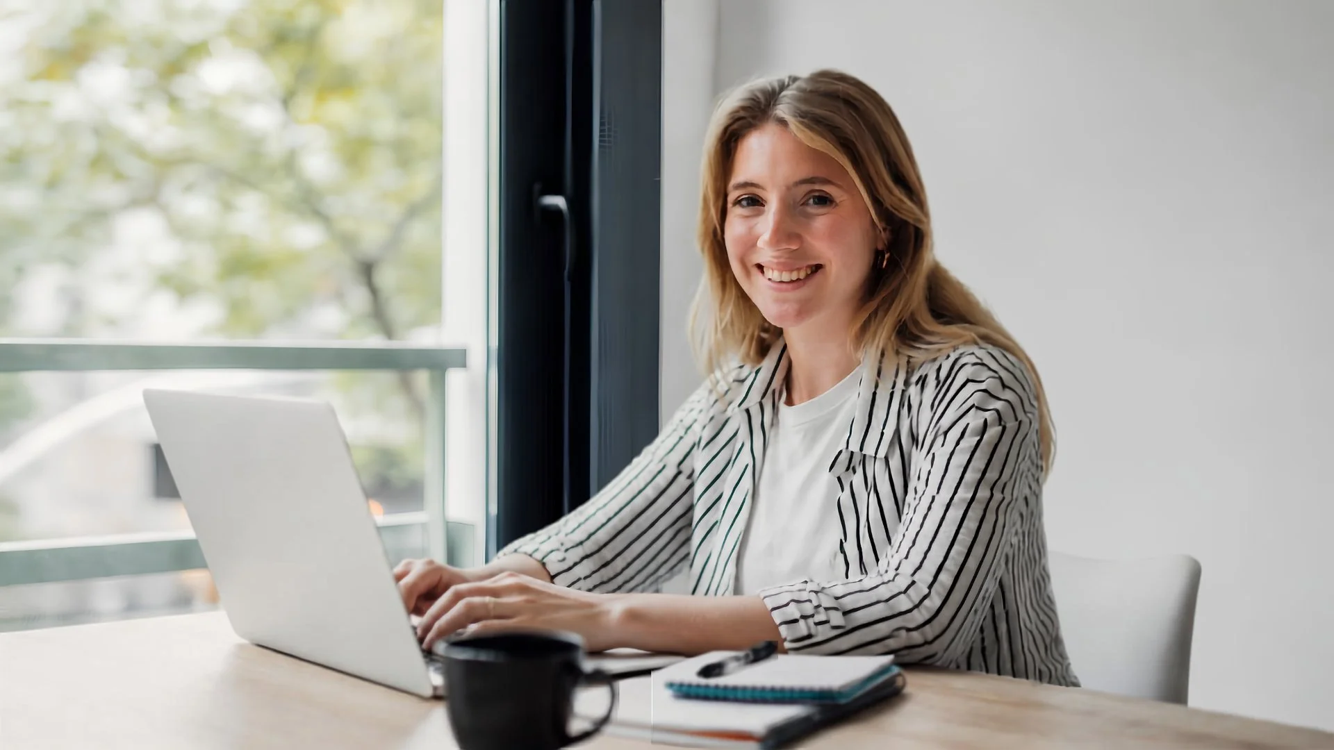 AddJoy woman working at desk