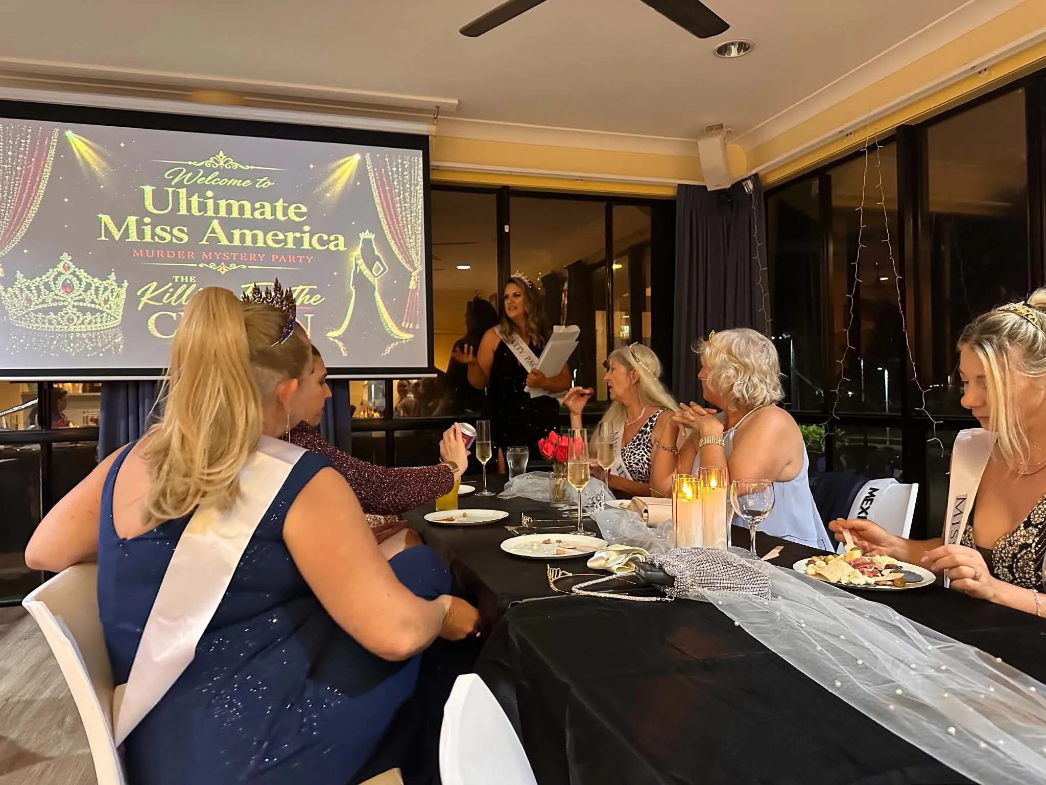 Guests taking part in NQ Entertainment’s Killing for the Crown interactive murder mystery event in Townsville.