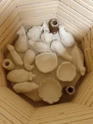 The clay pieces in the kiln