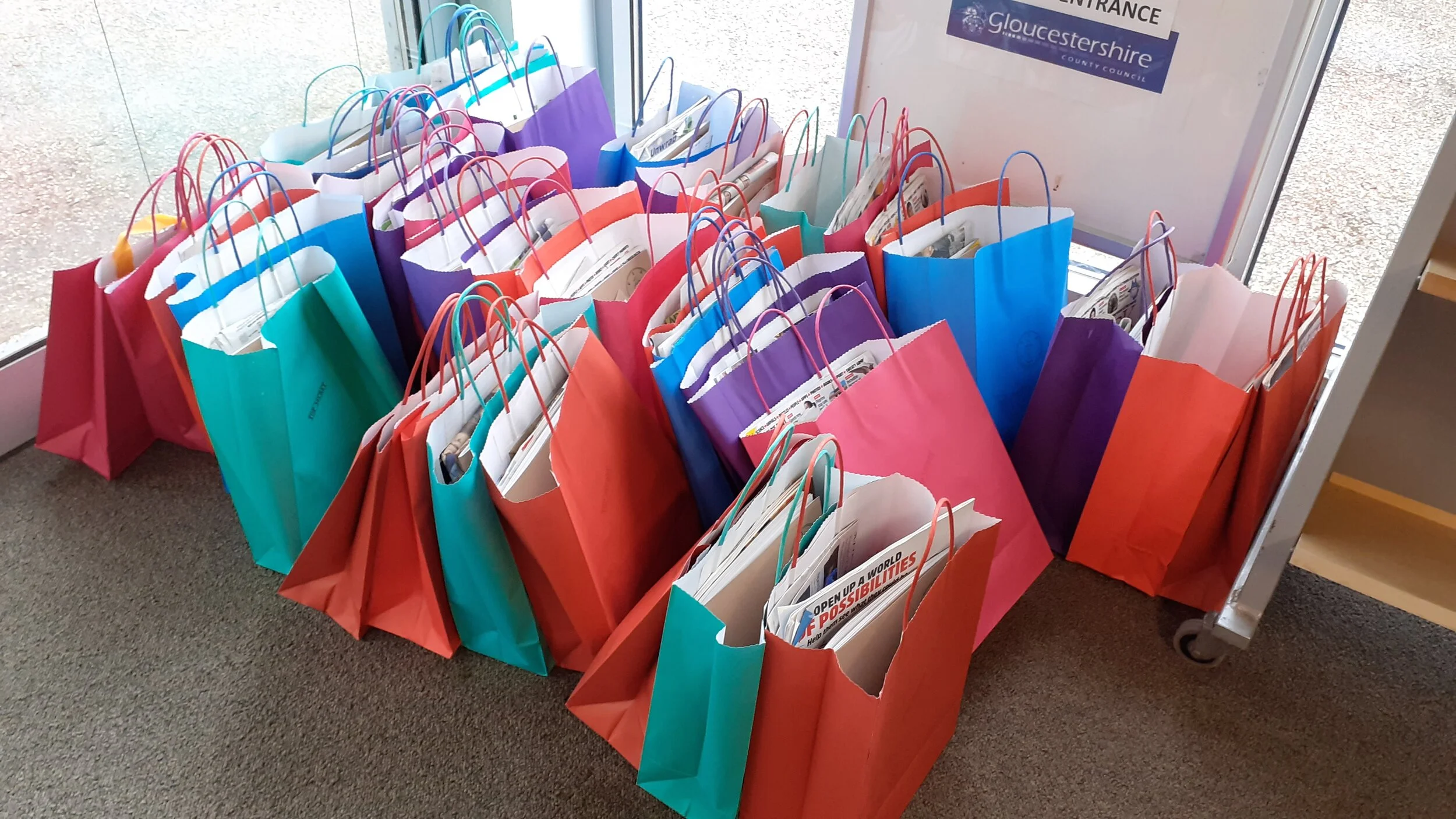 The creative packs waiting at Cirencester Library ready to be delivered by staff to the children to complete their mission!