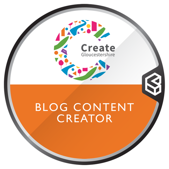 An orange and white badge with the Create Gloucestershire logo on it and 'Blog Content Creator' text under that.