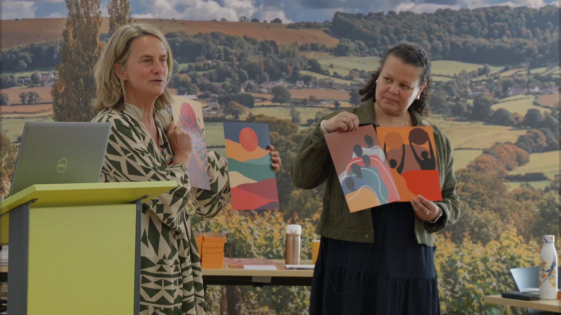 Pippa Create Glos founder and Tracey Co-director showing the art work of Lucy Turner.