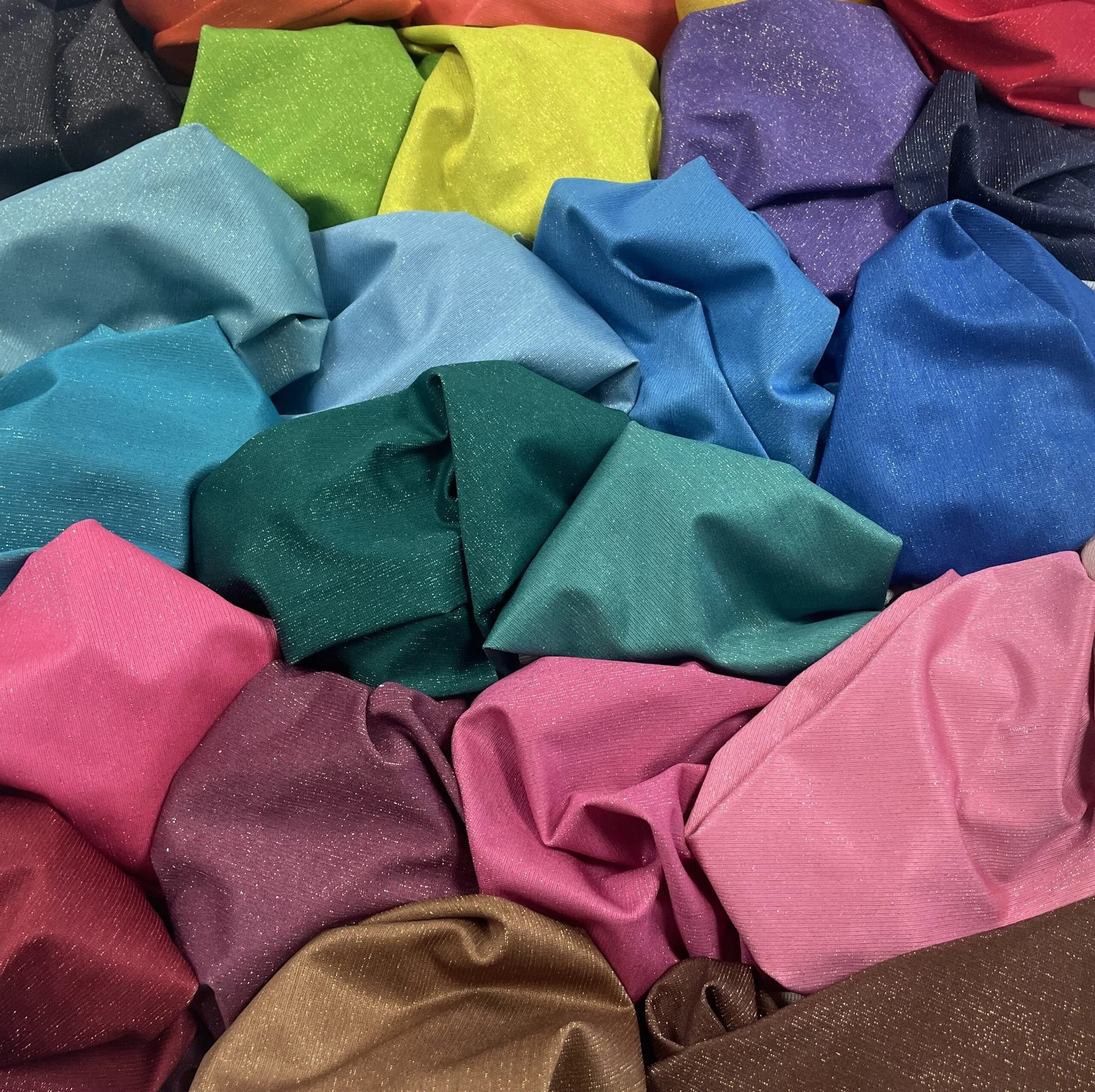 Polyester/lamé and elastane fabric in assorted colours, printed in Como, for lingerie and swimwear