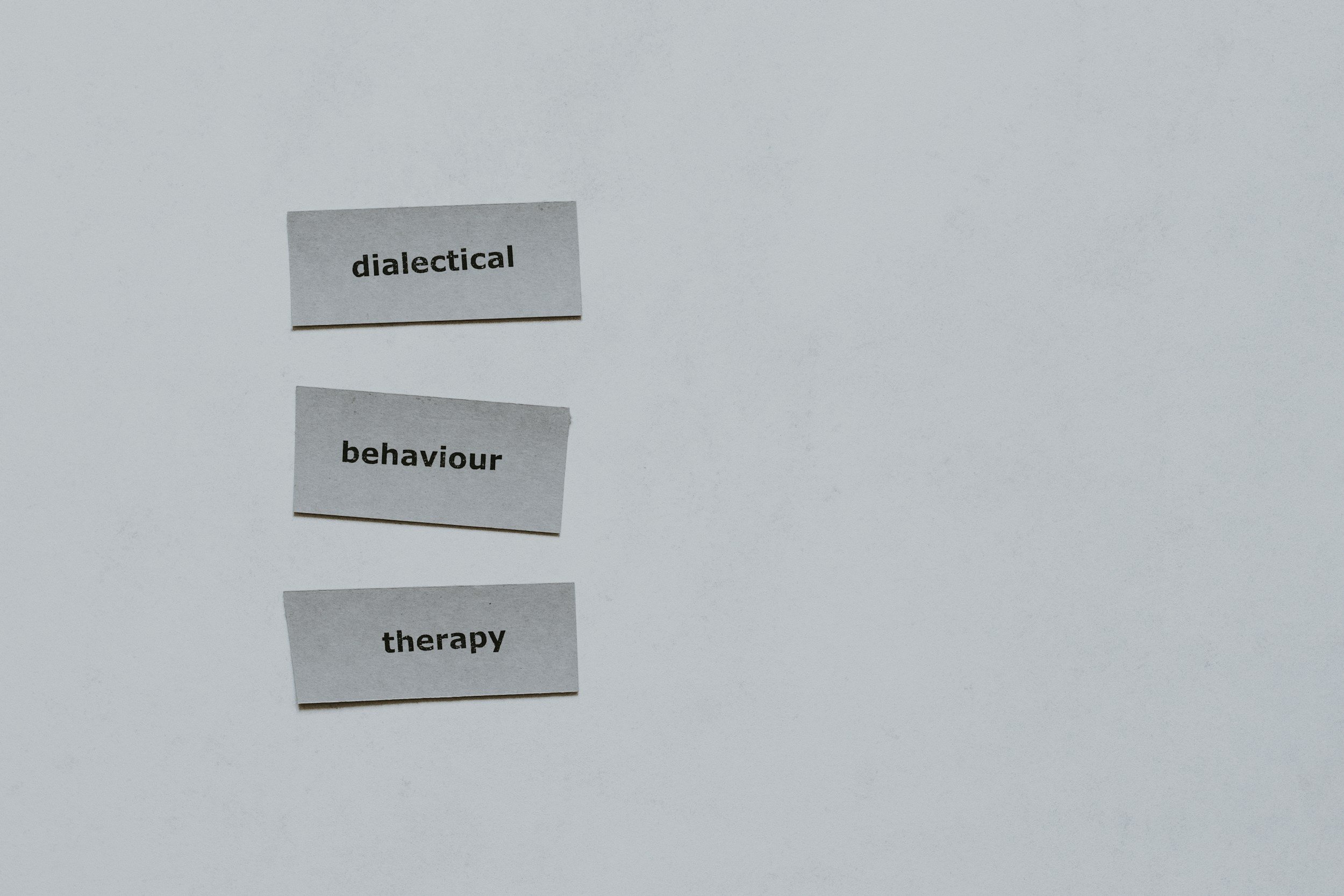 An image of the three words dialectical behavior therapy, a service offered virtually in Massachusetts