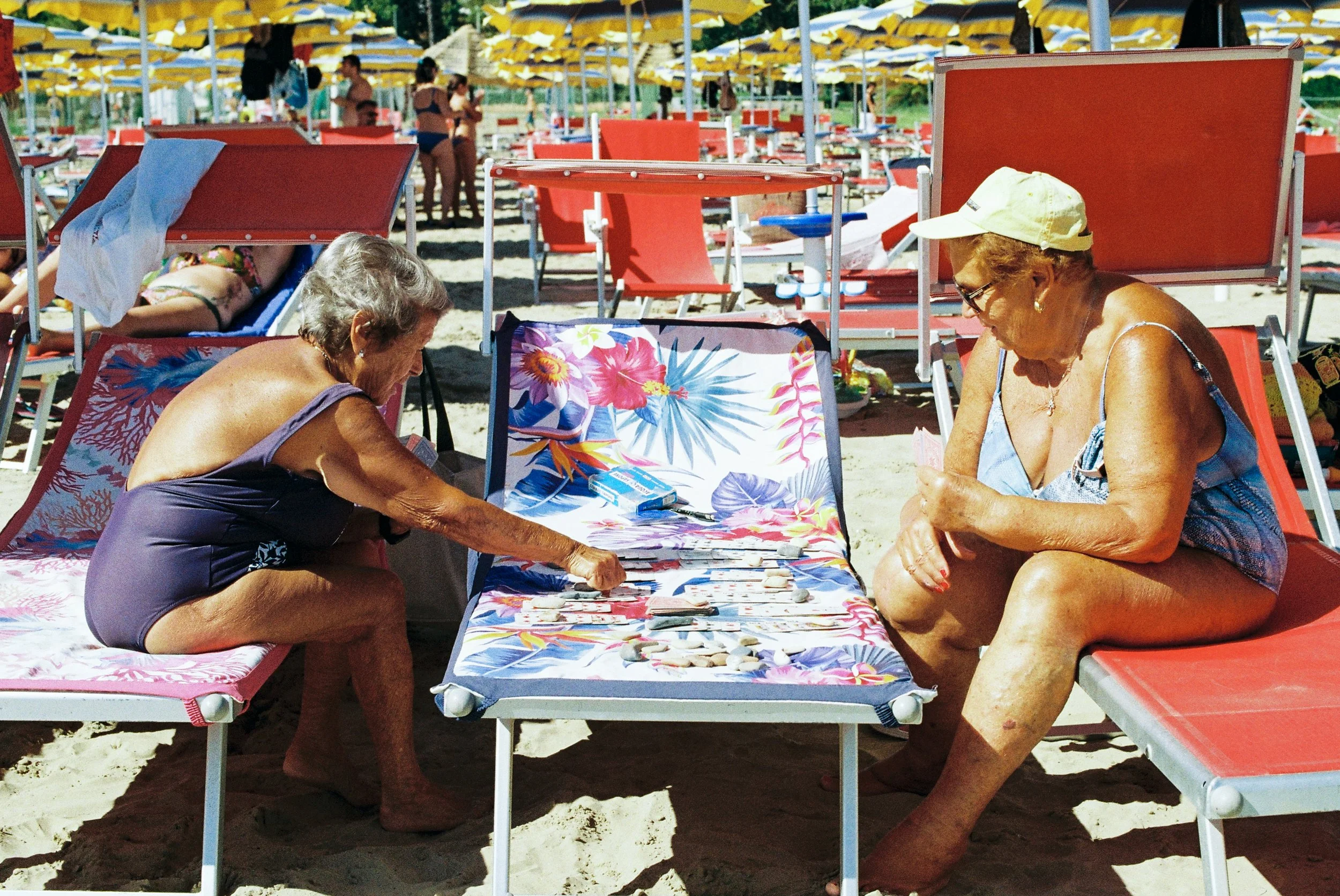 Nonnas playing cards at the beach