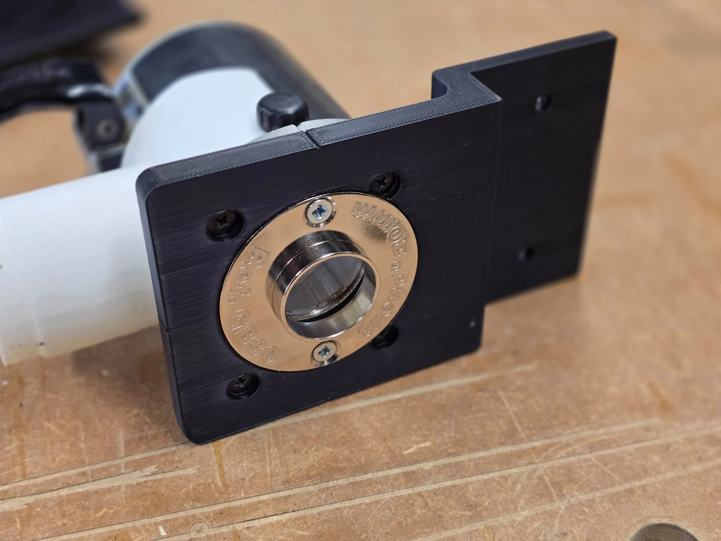 Motam Woodworks router base fitted with a Trend guide bush