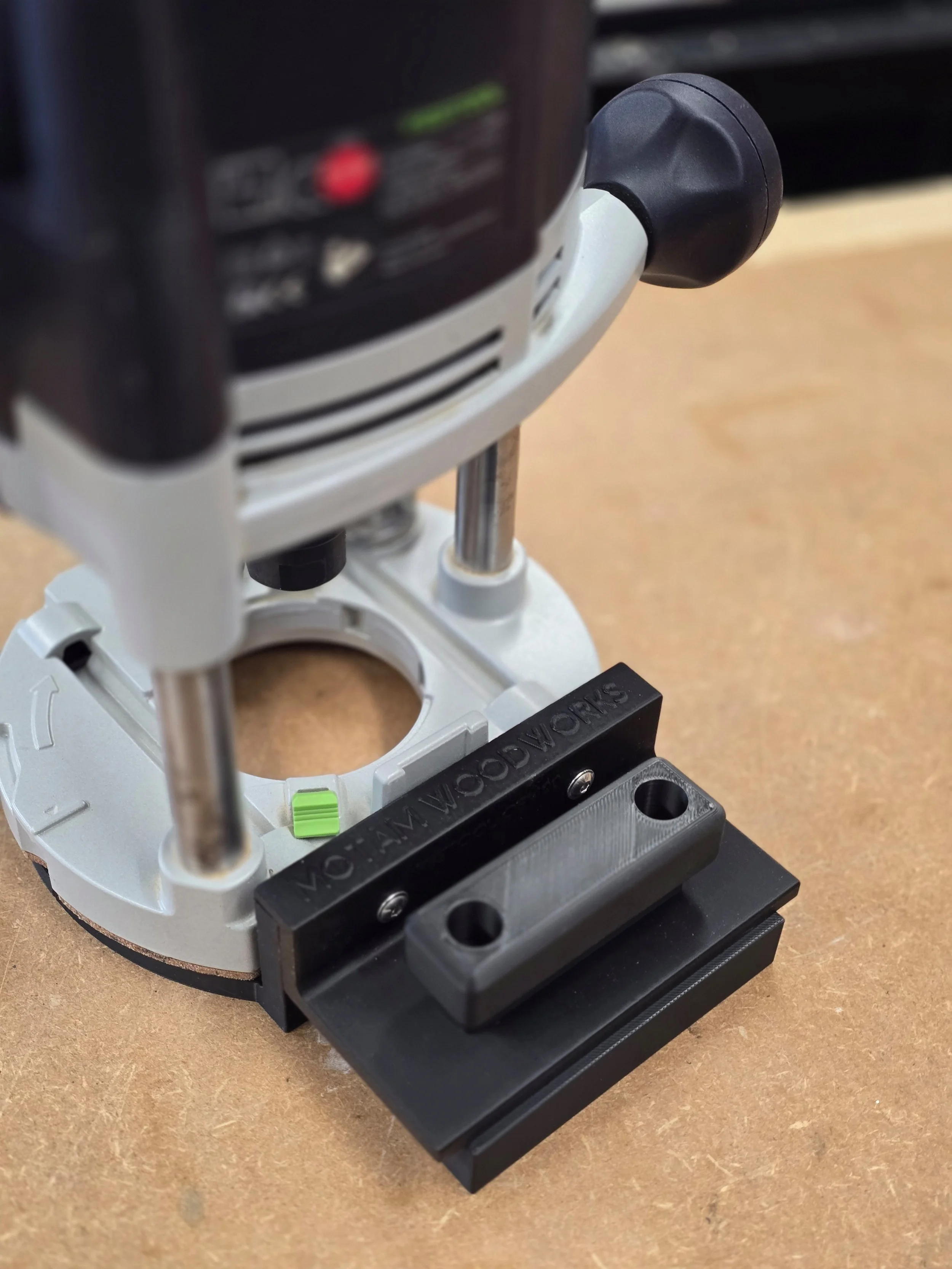 Close-up of the Motam Woodworks base and handle fitted to a Festool OF1400 router