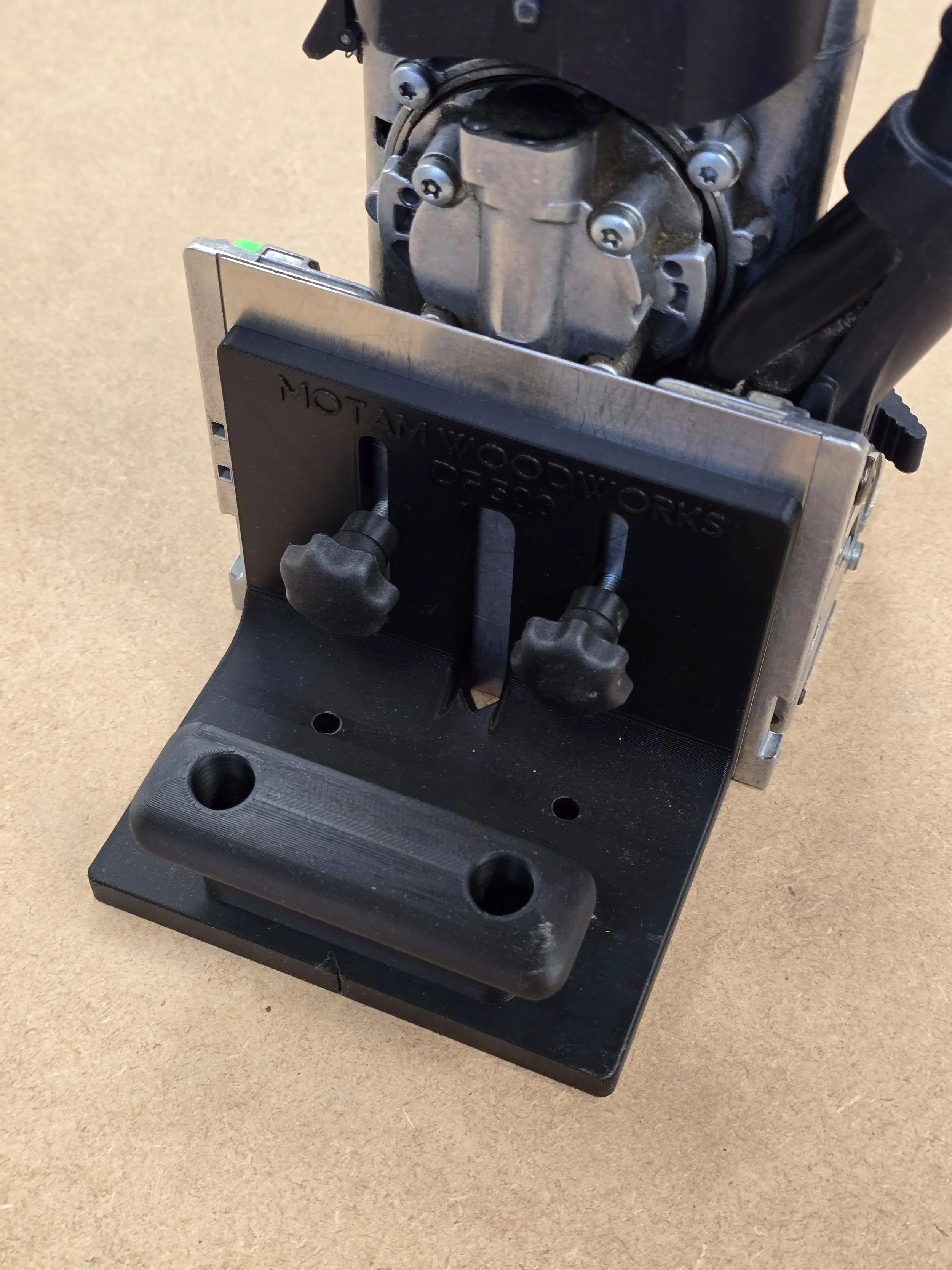 Close-up of the Motam Woodworks DF500 fence and handle assembly on a Festool Domino DF500