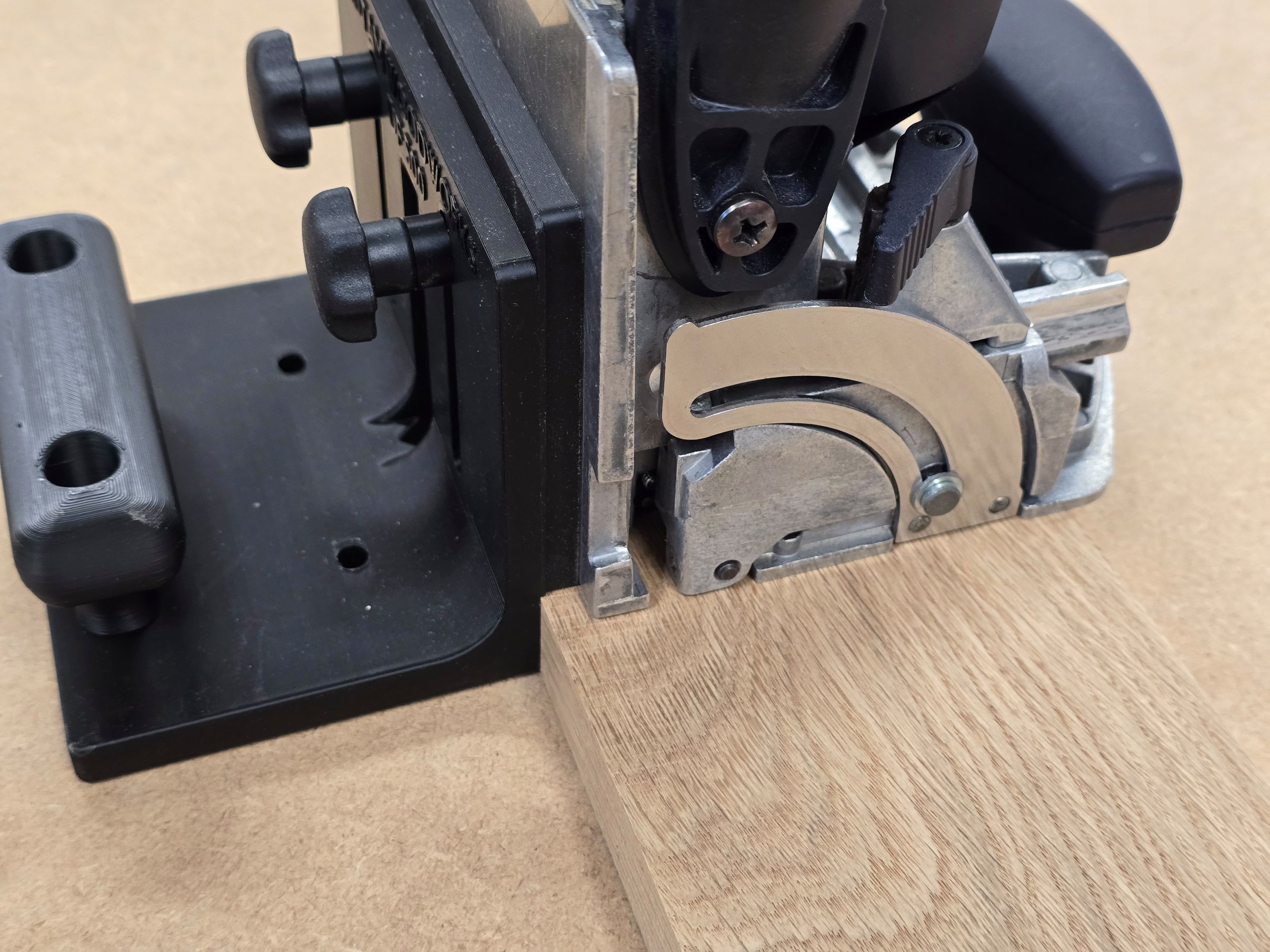 Offset shim in position on the fence while cutting a mortise into a workpiece