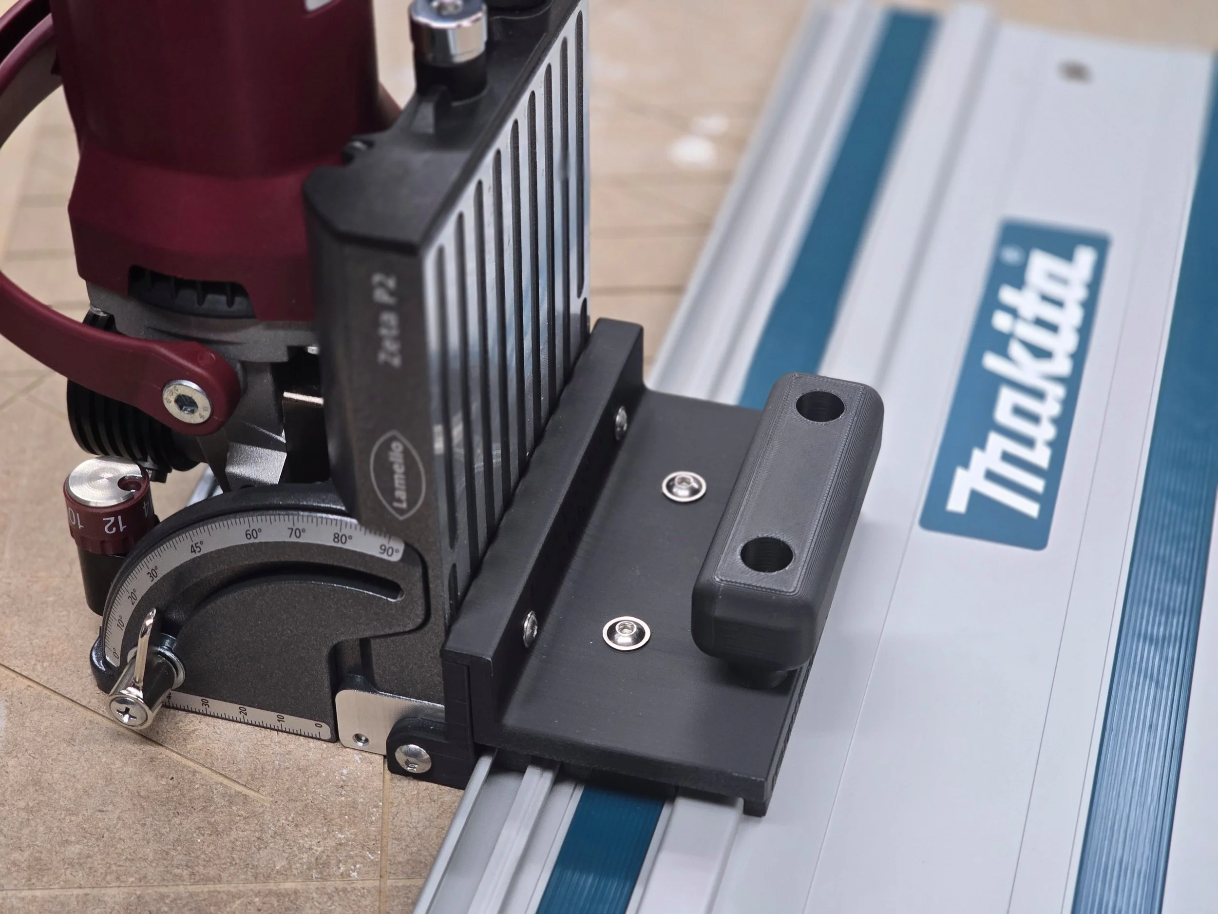 Lamello Zeta P2 fitted with the Motam Woodworks guide rail adaptor and handle, mounted on a Makita guide rail
