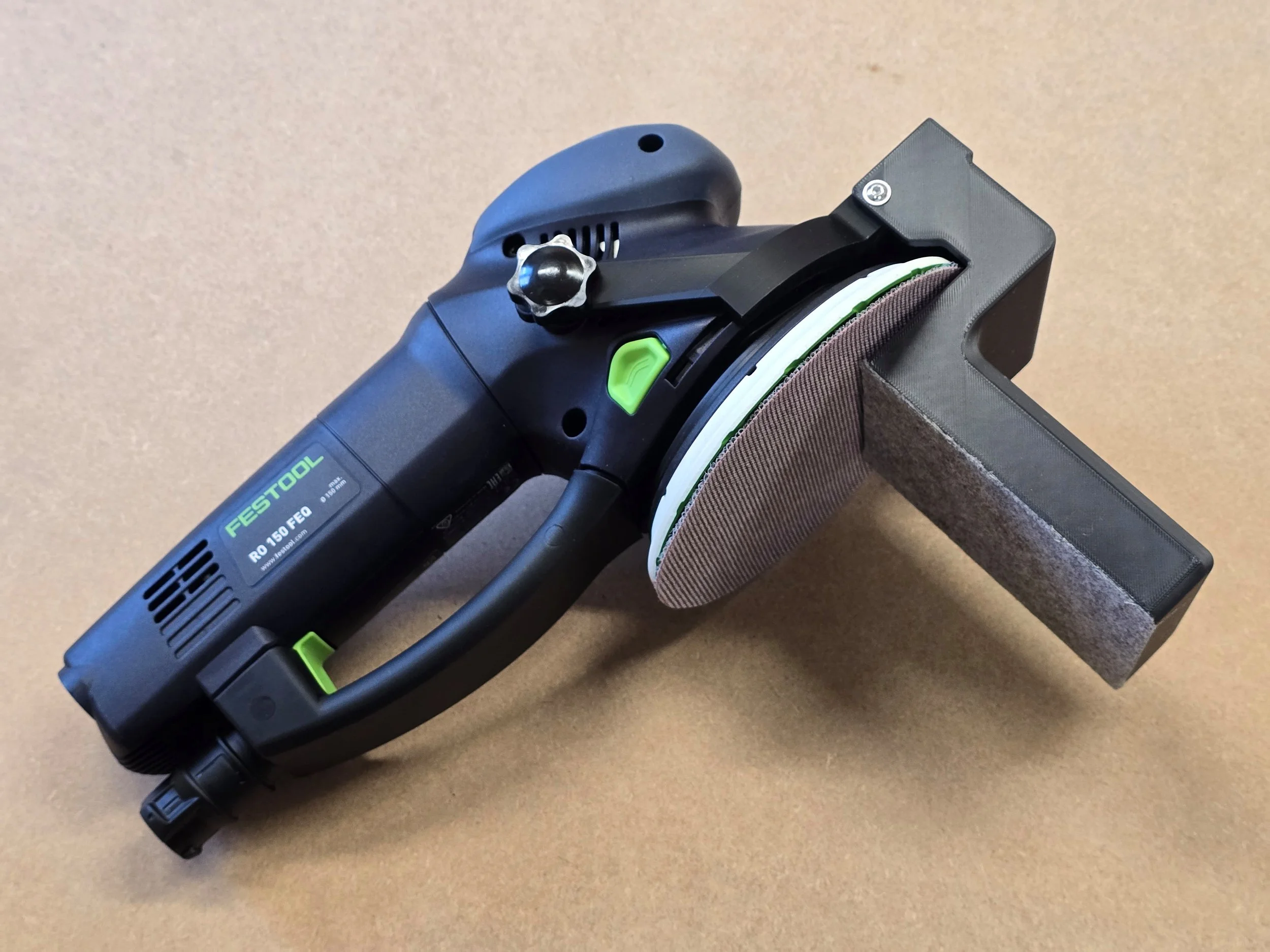 The Motam edge guide fitted to a Festool Rotex RO 150 FEQ sander