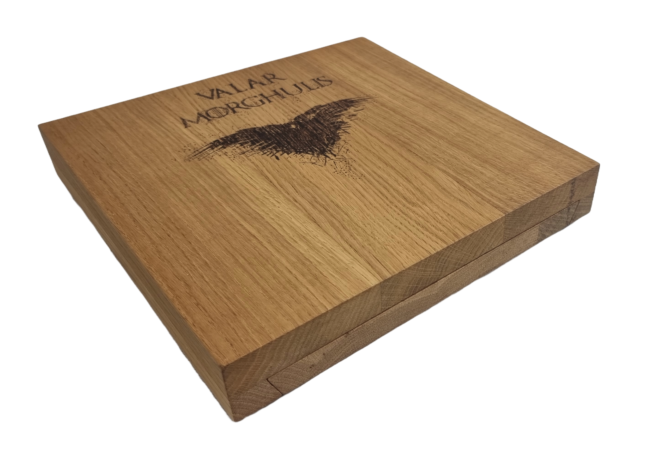 Closed oak cheese board engraved with "Valar Morghulis" and a raven design