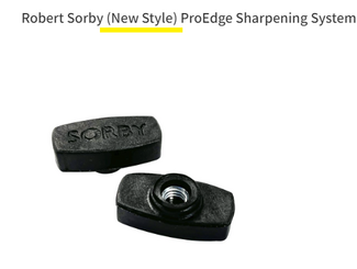 Close-up of two black ProEdge sharpening system components with the brand name 'SORBY' engraved on one piece, showing a threaded insert.
