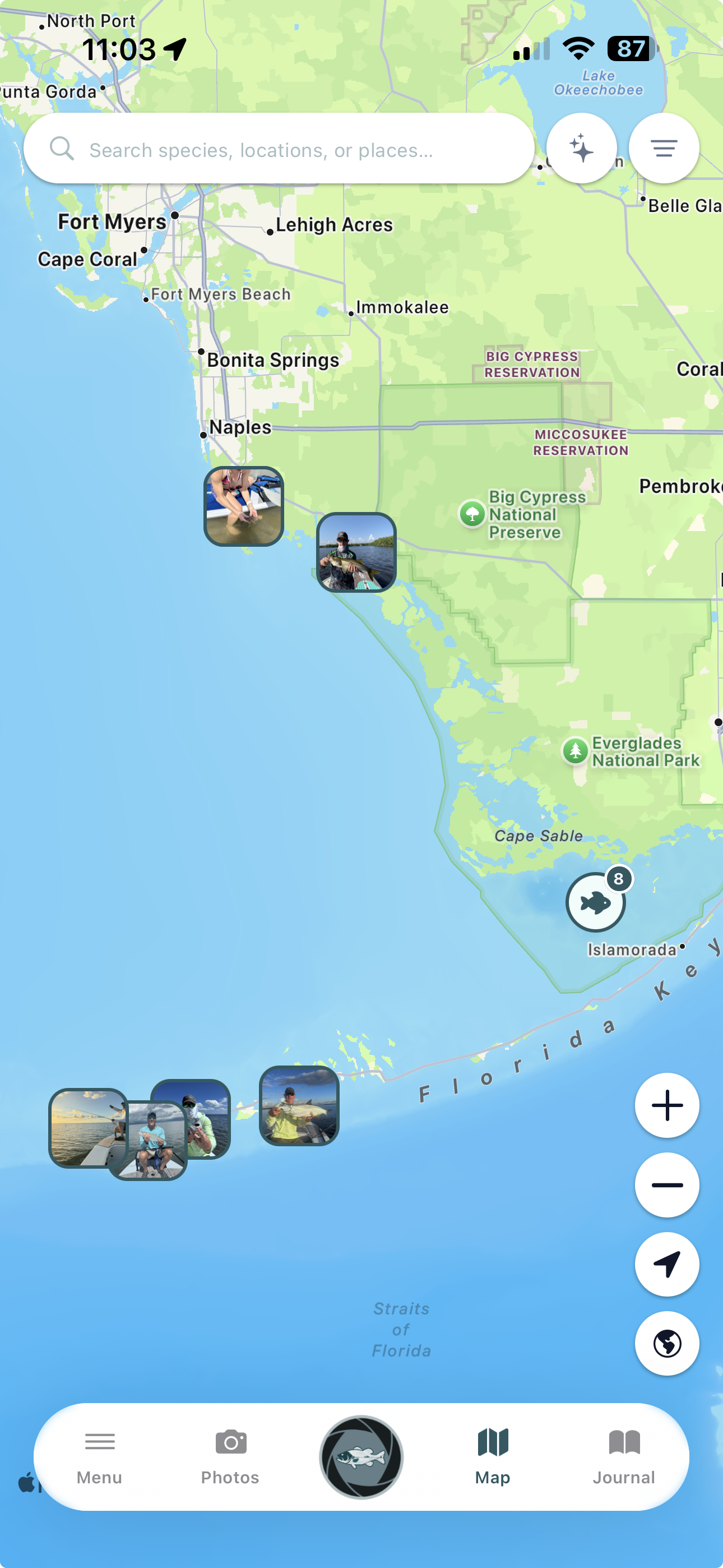 Mobile map screen showing fishing locations along the southwestern coast of Florida, with user photos of fishing activities overlaid on the map. Landmarks include Big Cypress National Preserve and Everglades National Park, with the Atlantic Ocean on the left.