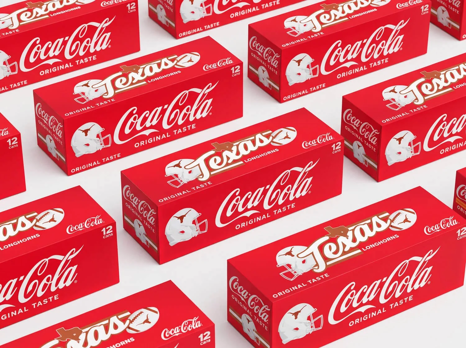 Multiple red Coca-Cola boxes with Texas Longhorns and football helmet logos, arranged in a pattern.