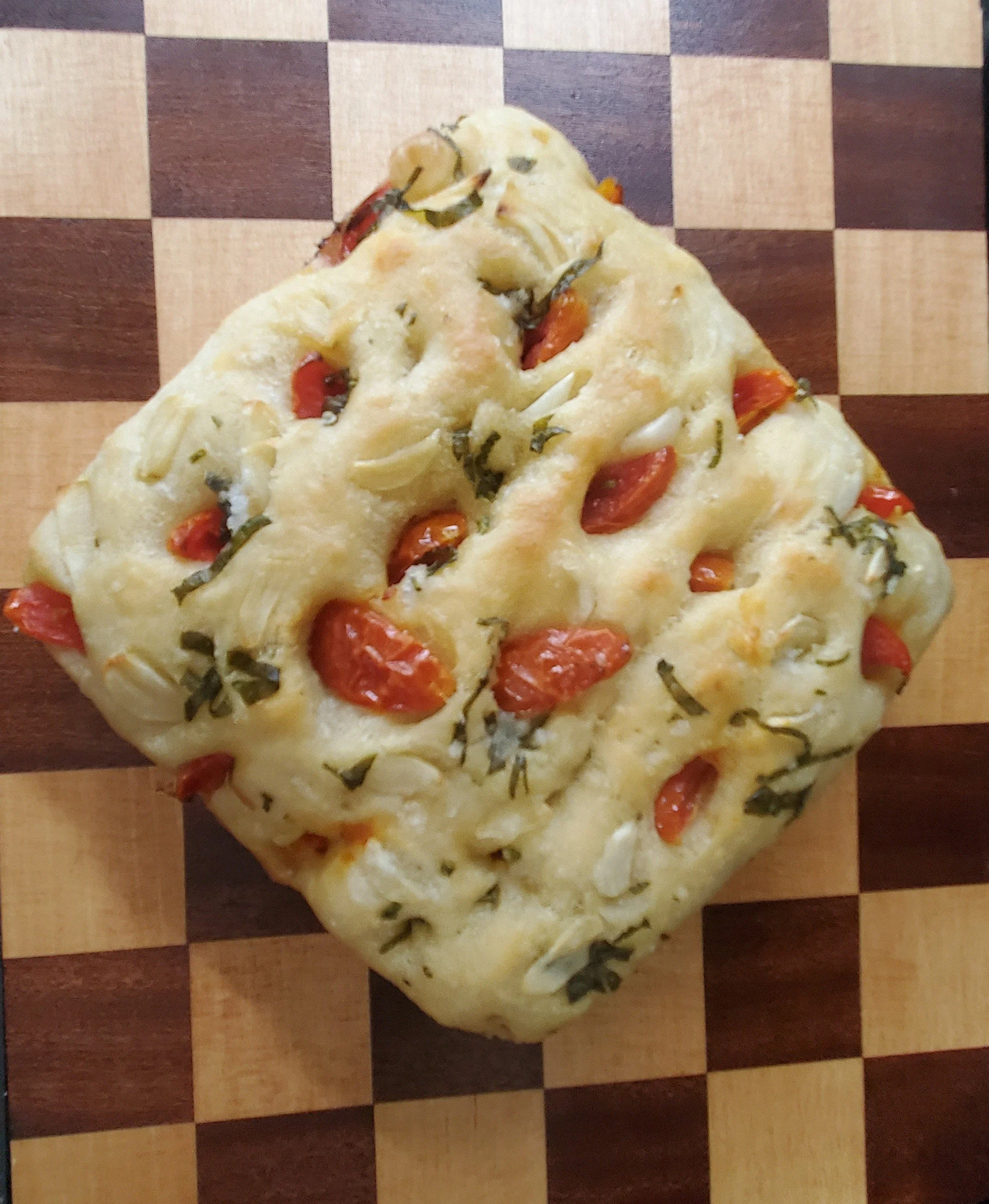 Grape tomato, garlic and basil focaccia