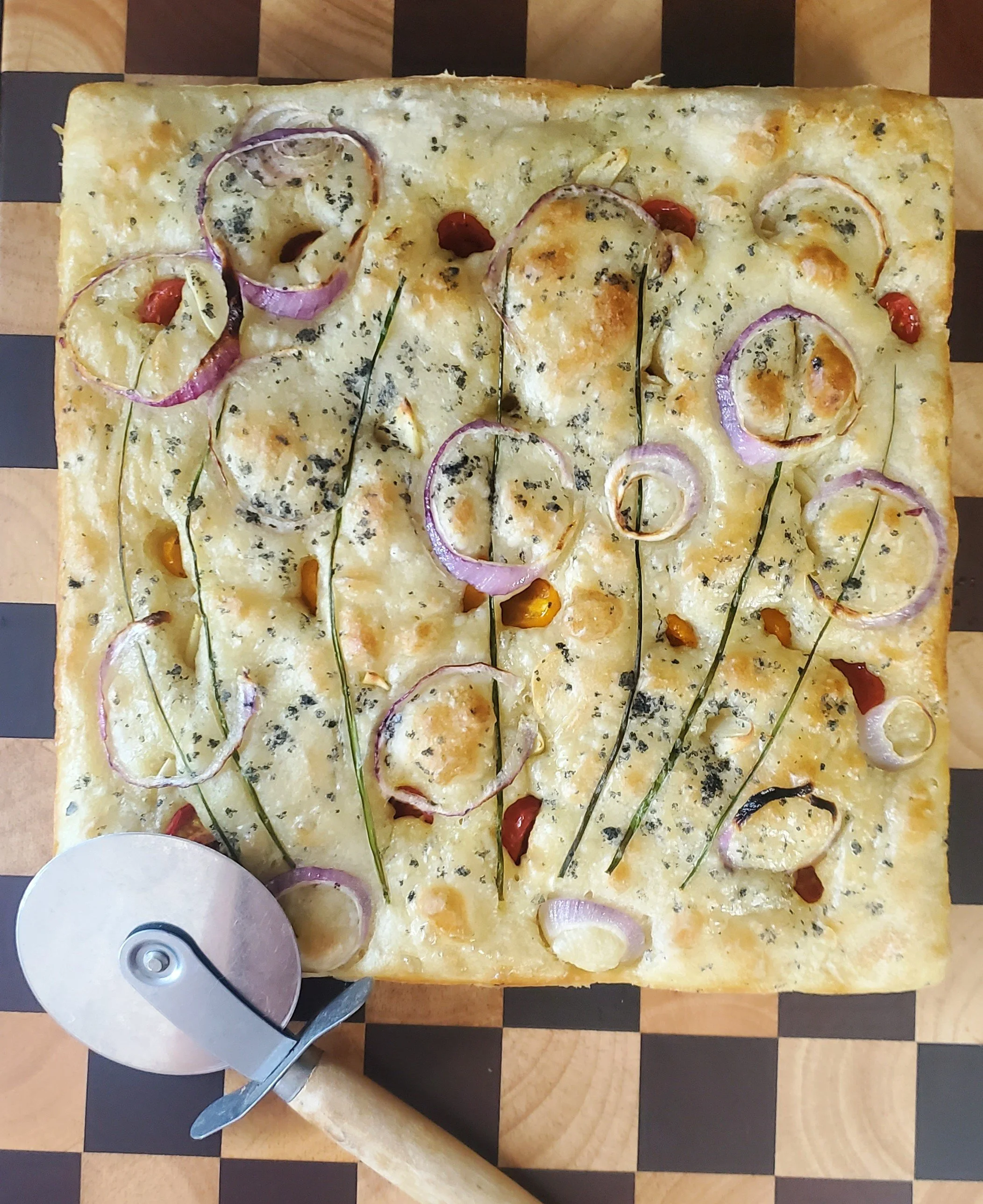 Red onion, tomato, garlic and chive family sized focaccia