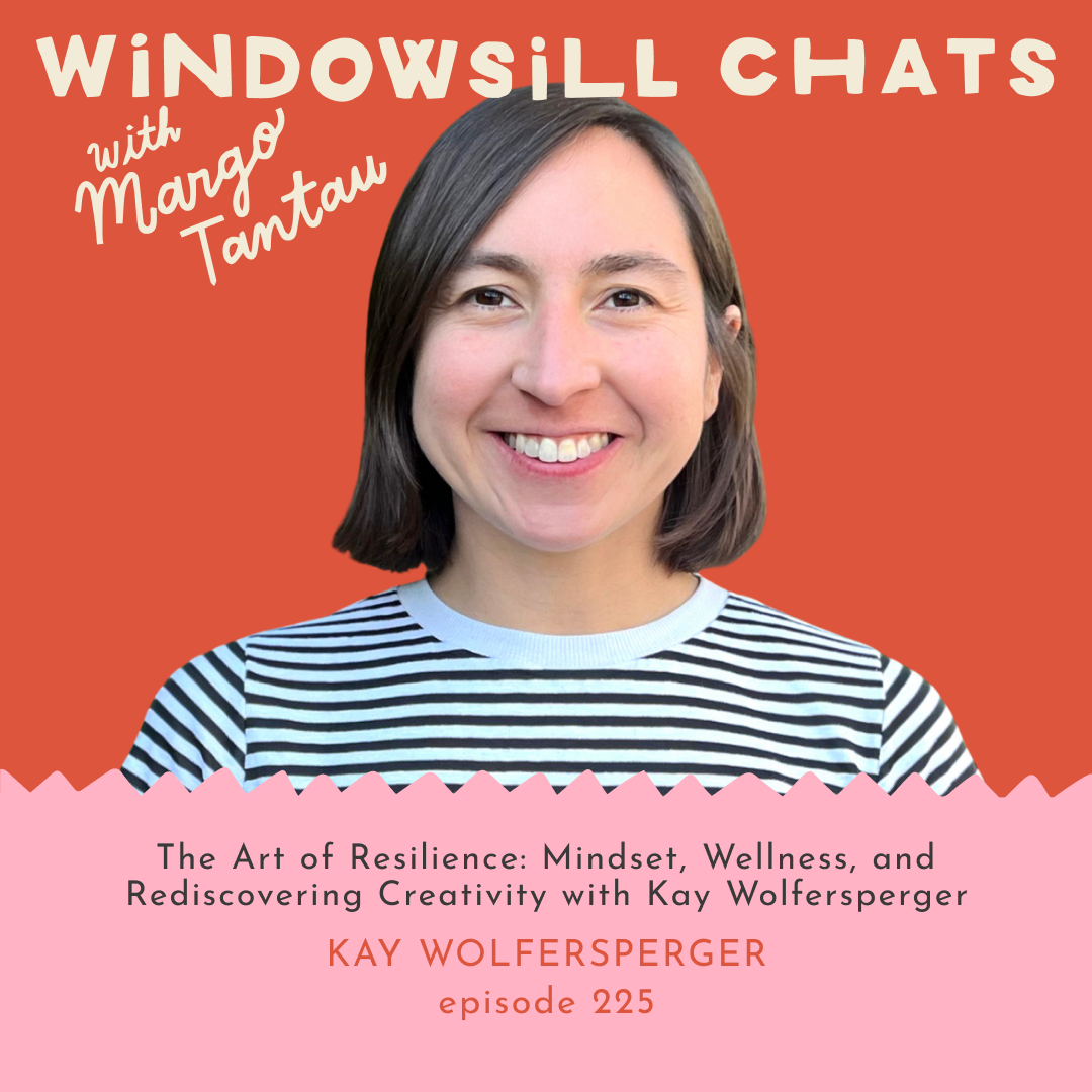 A promotional graphic for the podcast 'Windsill Chats with Mango Tatau' featuring Kay Wolfersperger. The graphic has an orange background with a pink wave at the bottom, and shows a woman with shoulder-length dark hair, smiling, wearing a black and white striped shirt.