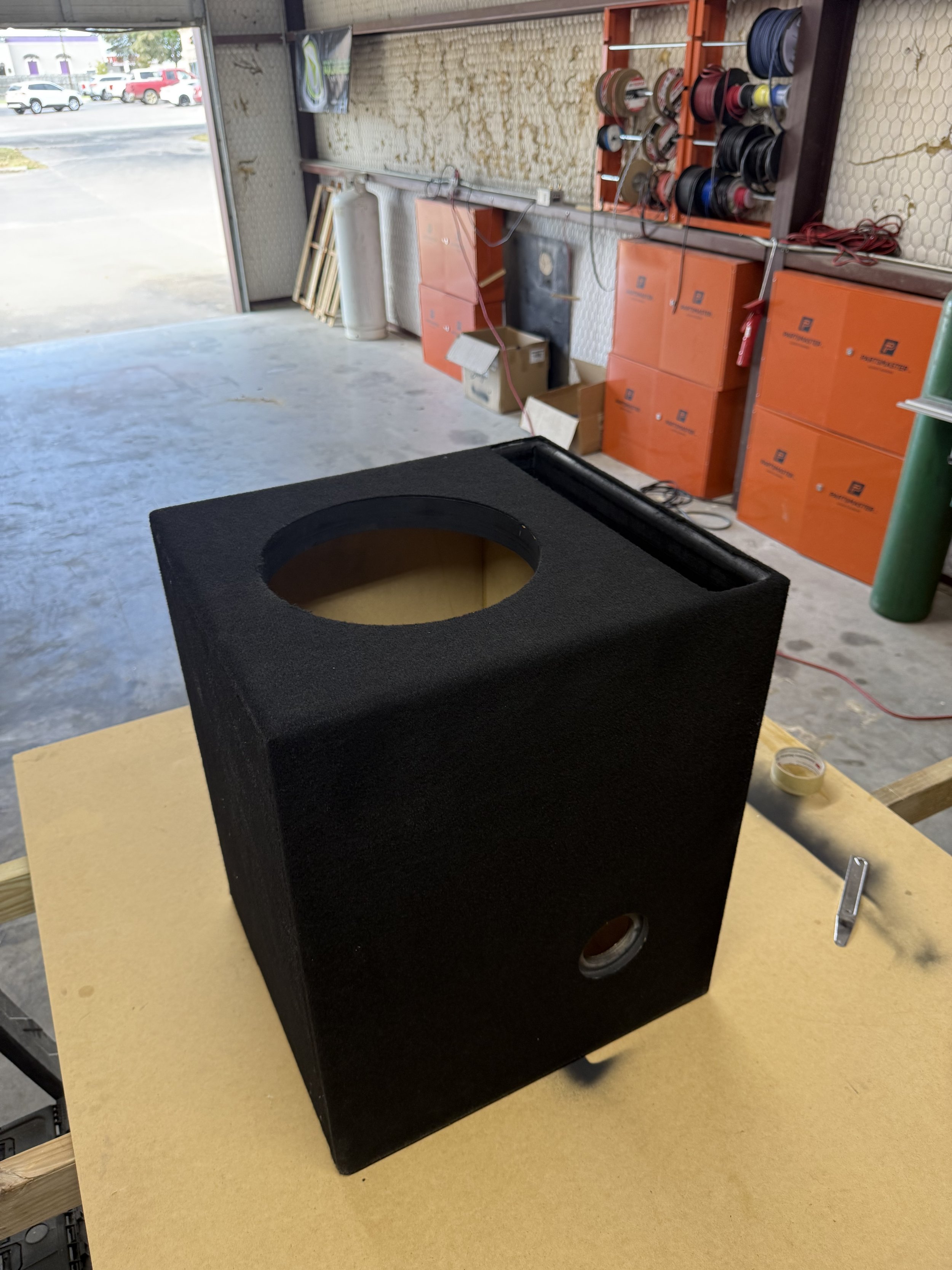 Custom enclosure for a Sundown M 12" Subwoofer in Cleburne, TX, by Studio 38.