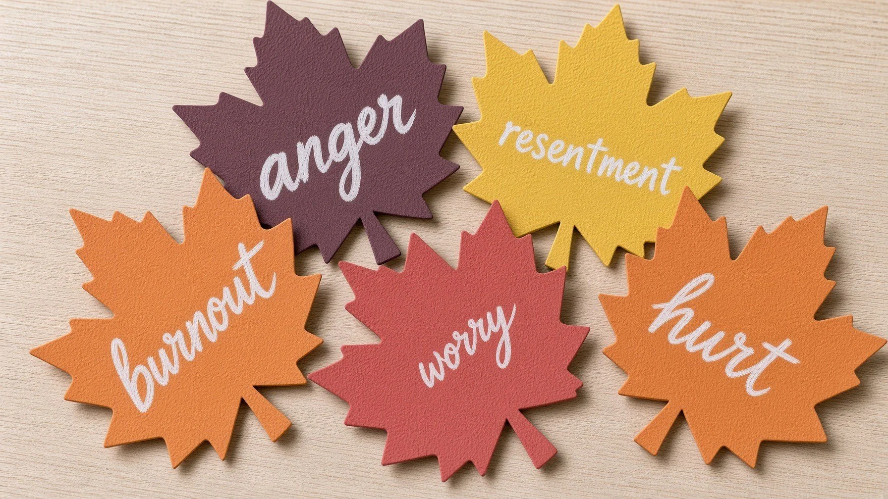 Autumn leaf cutouts used for letting-go writing exercise